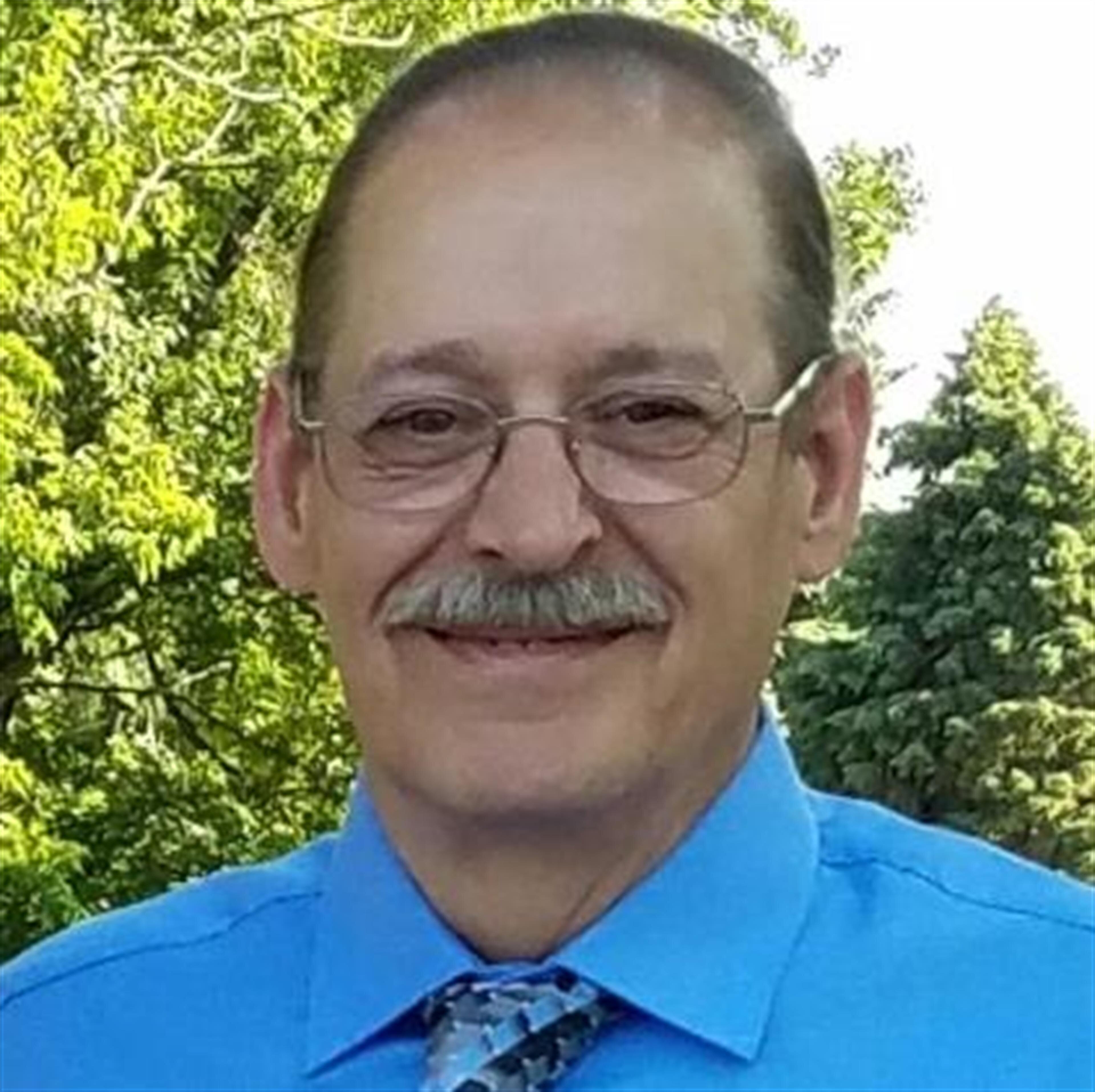 Dennis L. Garbula