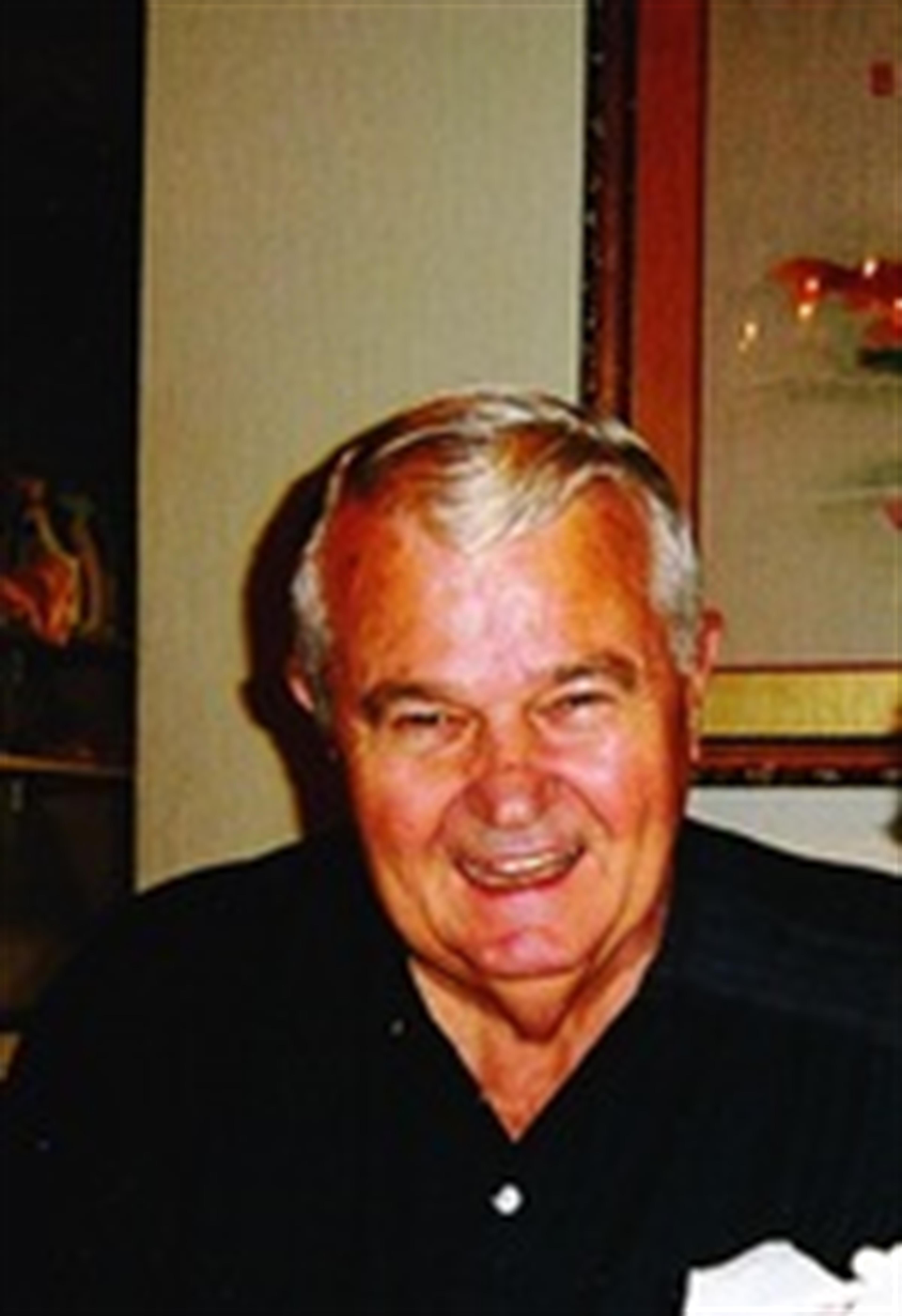 John H. Swann,  D.D.S.