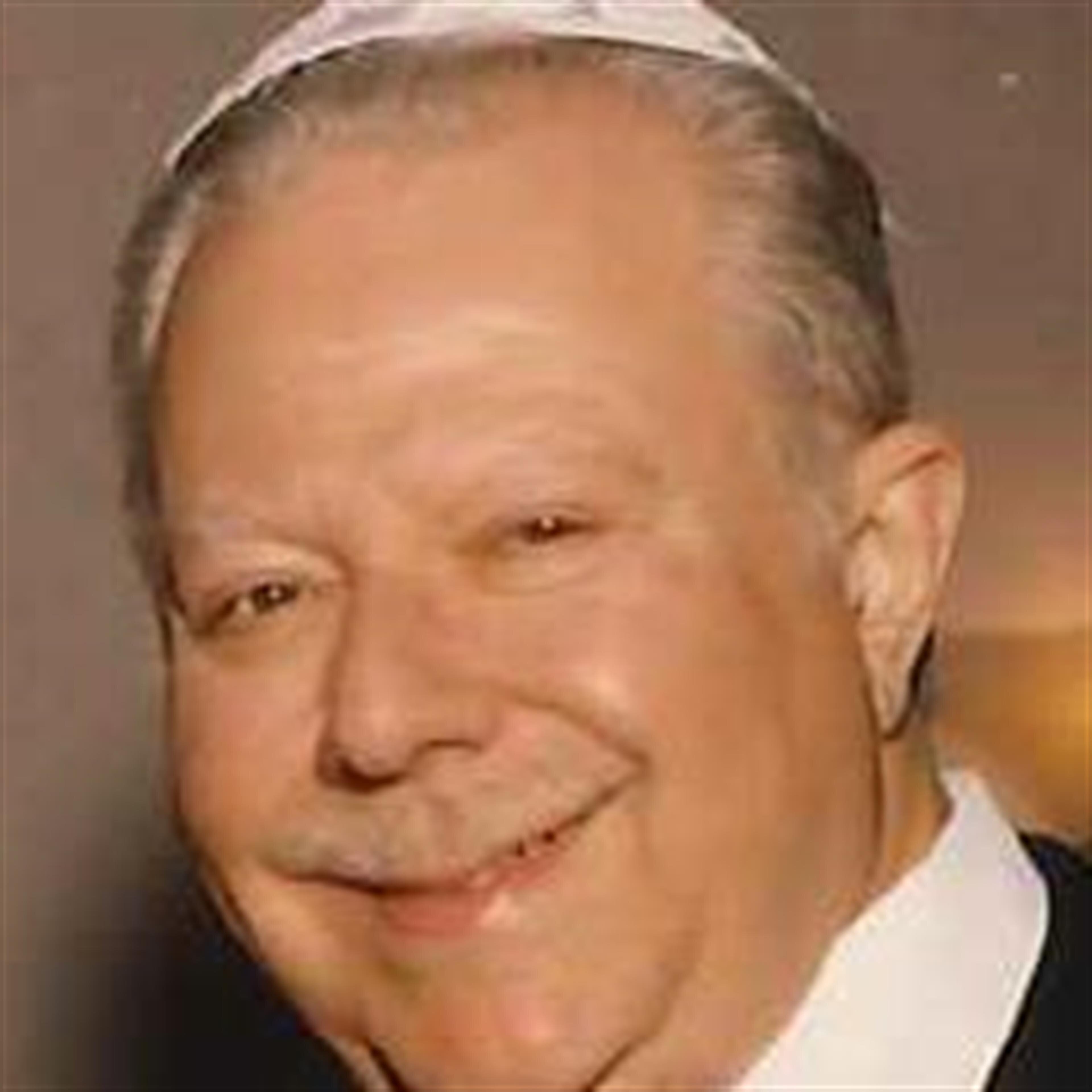 Lee E.  Rogers
