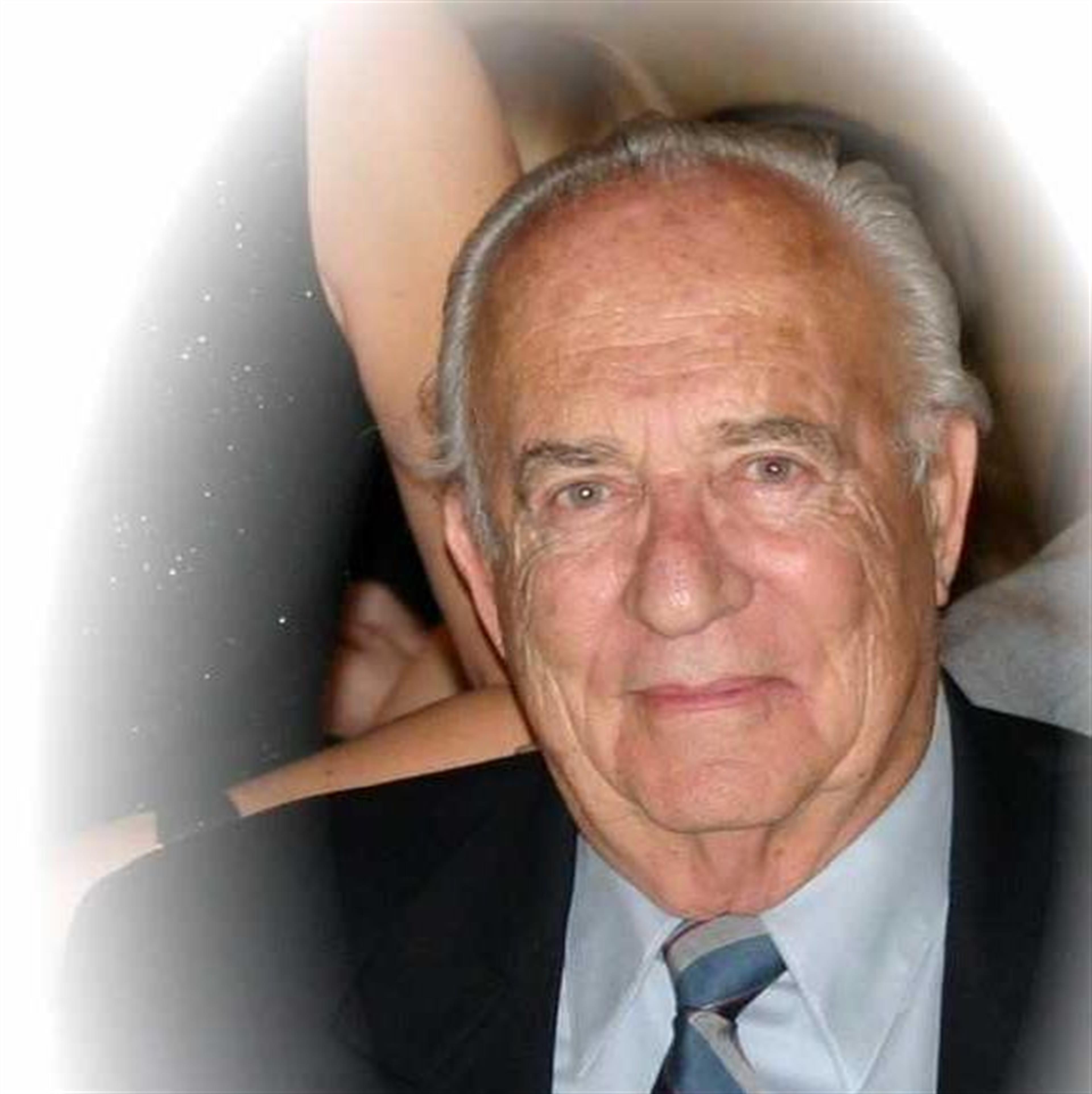 HOWARD E. GRANT
