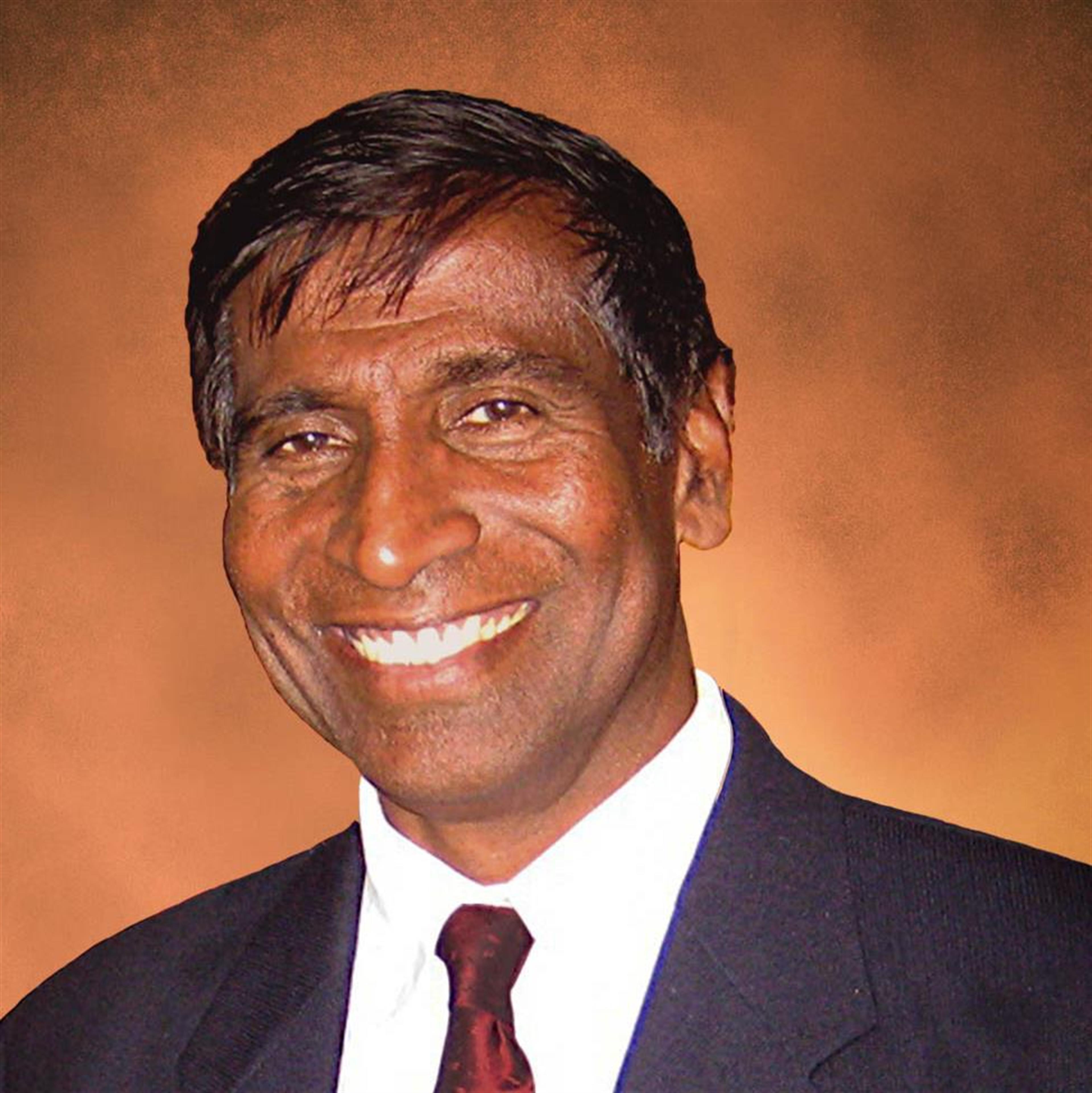 John P Thomas