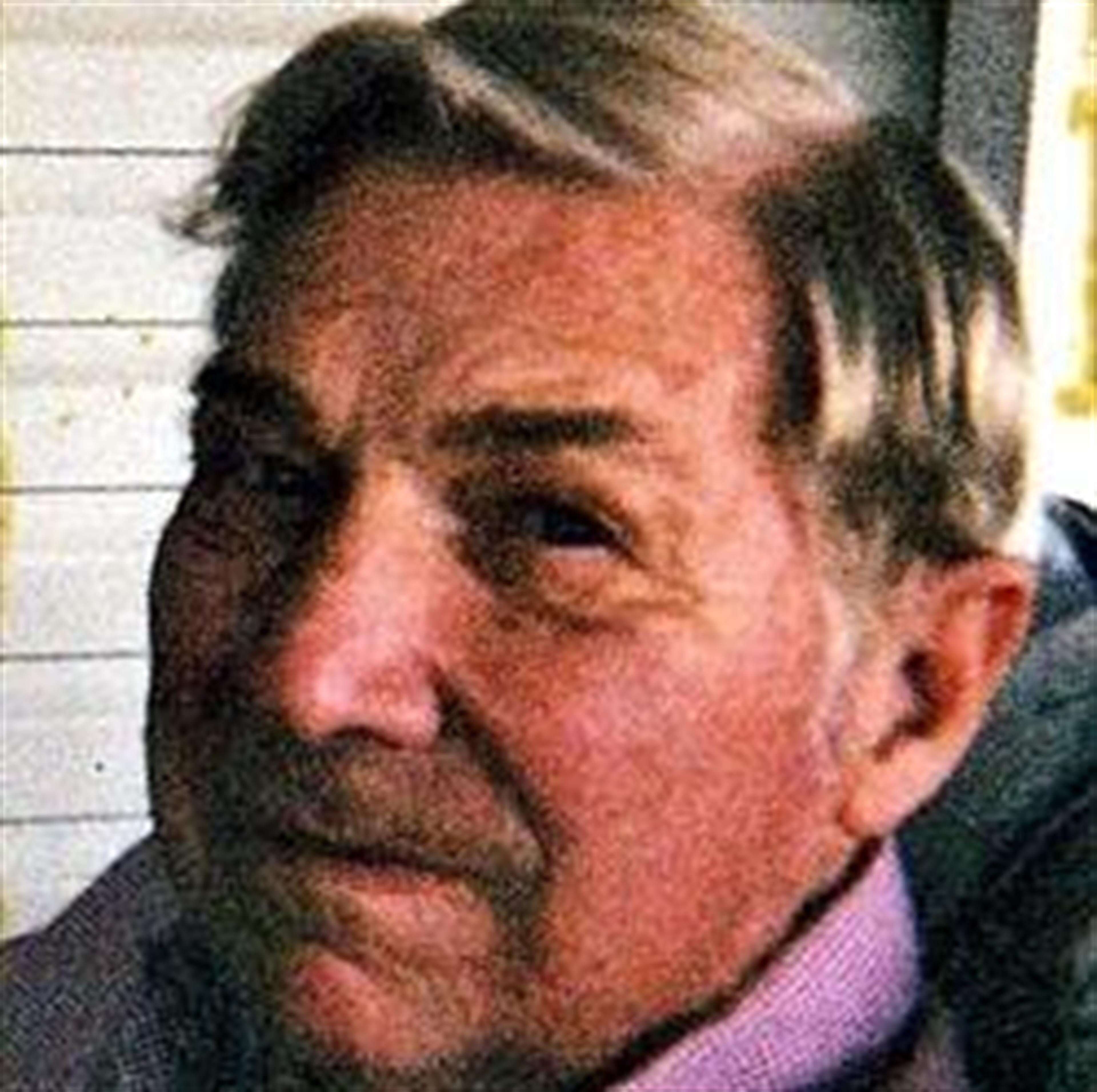 Russell W Holdych