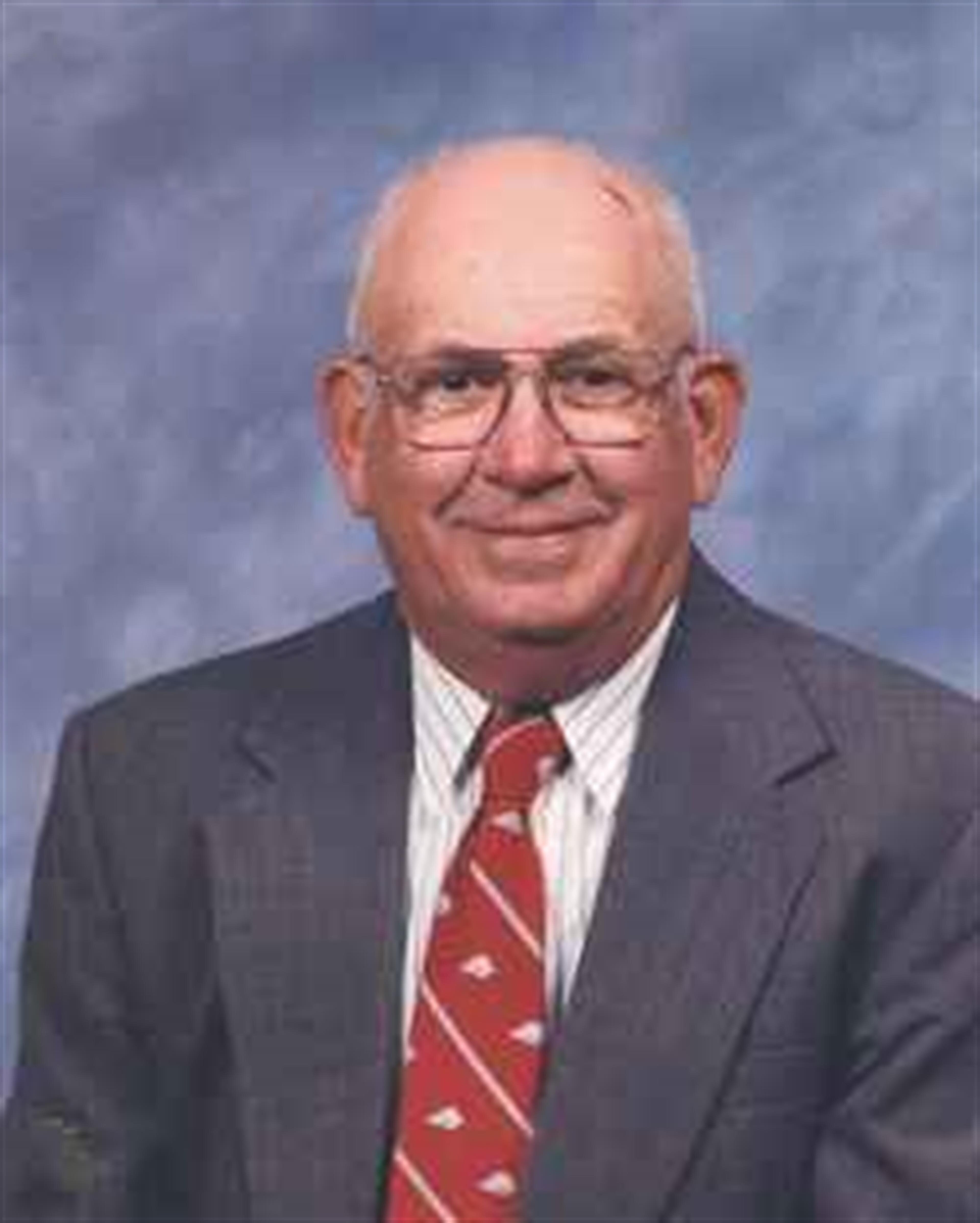 Dr. Thomas  Lionel  Barton