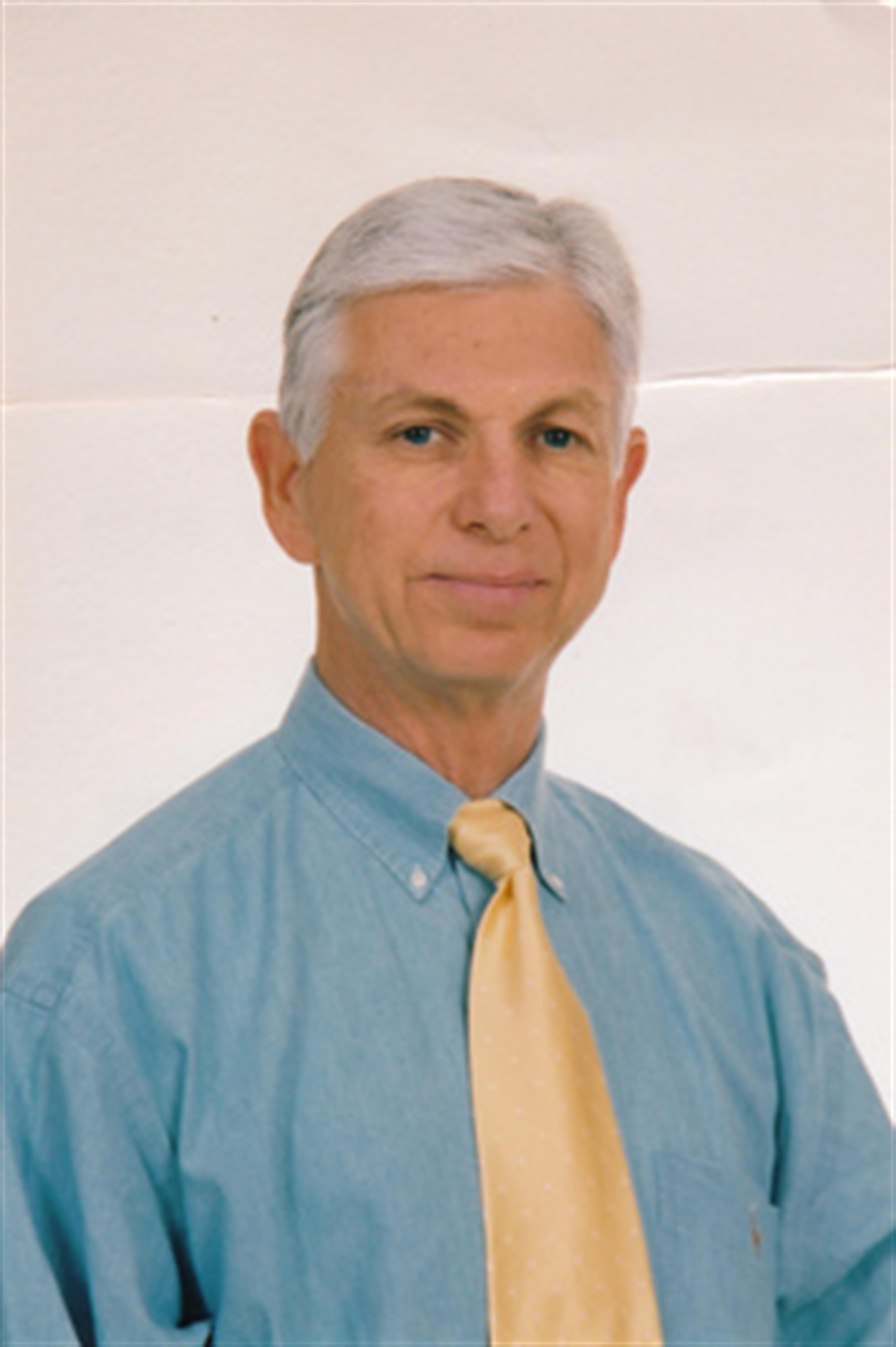 Dr. Clifford  C. Councille