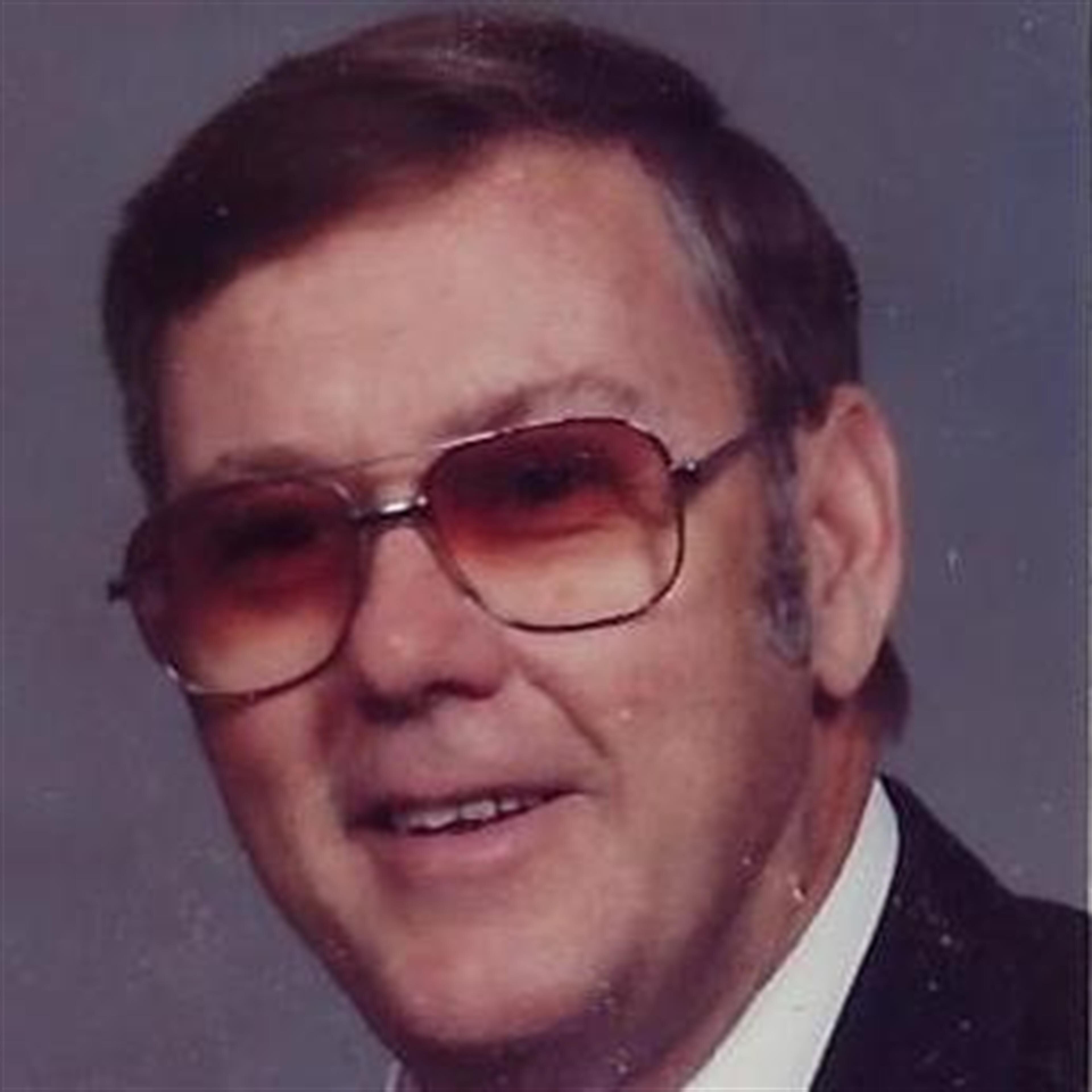 Claude Amos  Jr