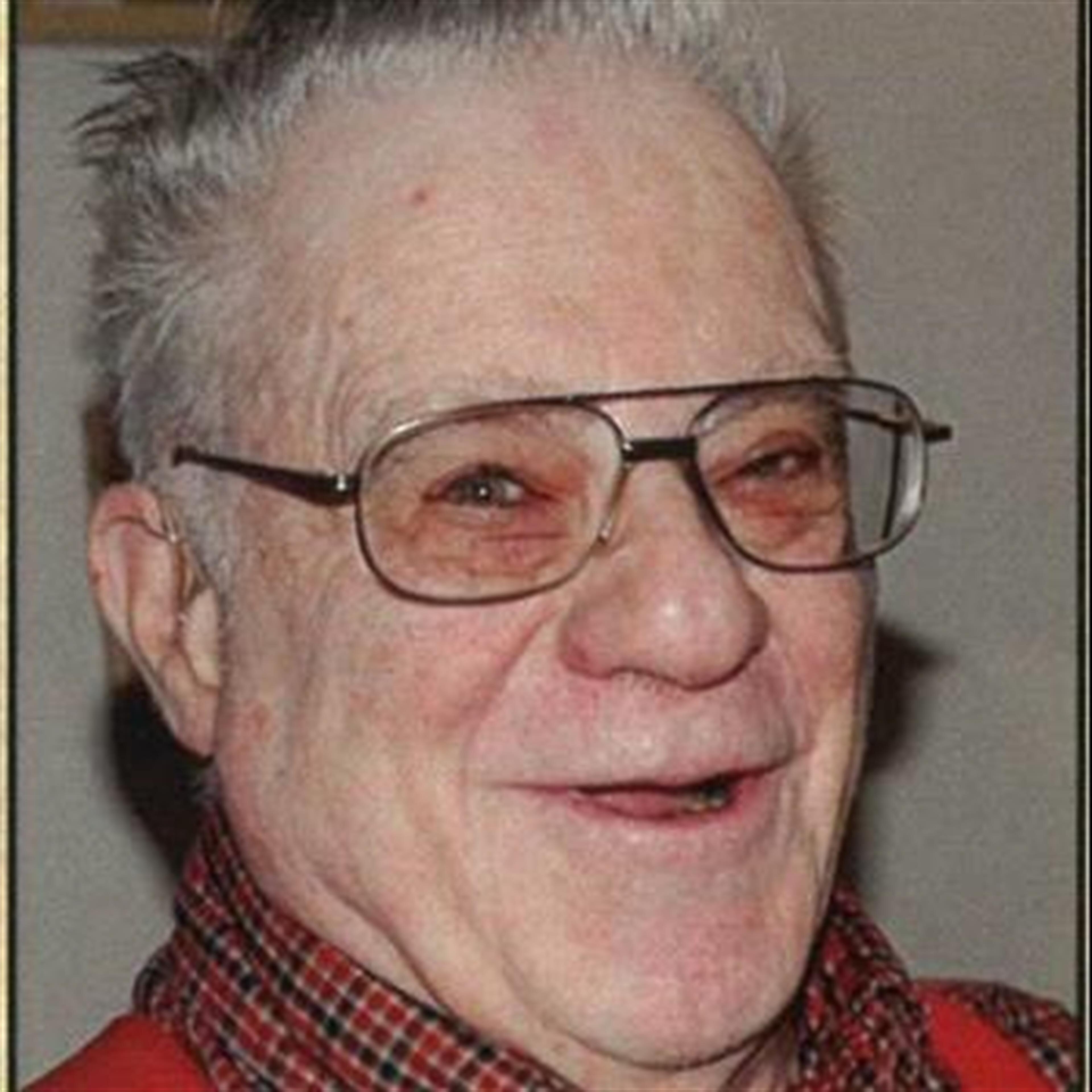 Kenneth " Ken"  L Cowan