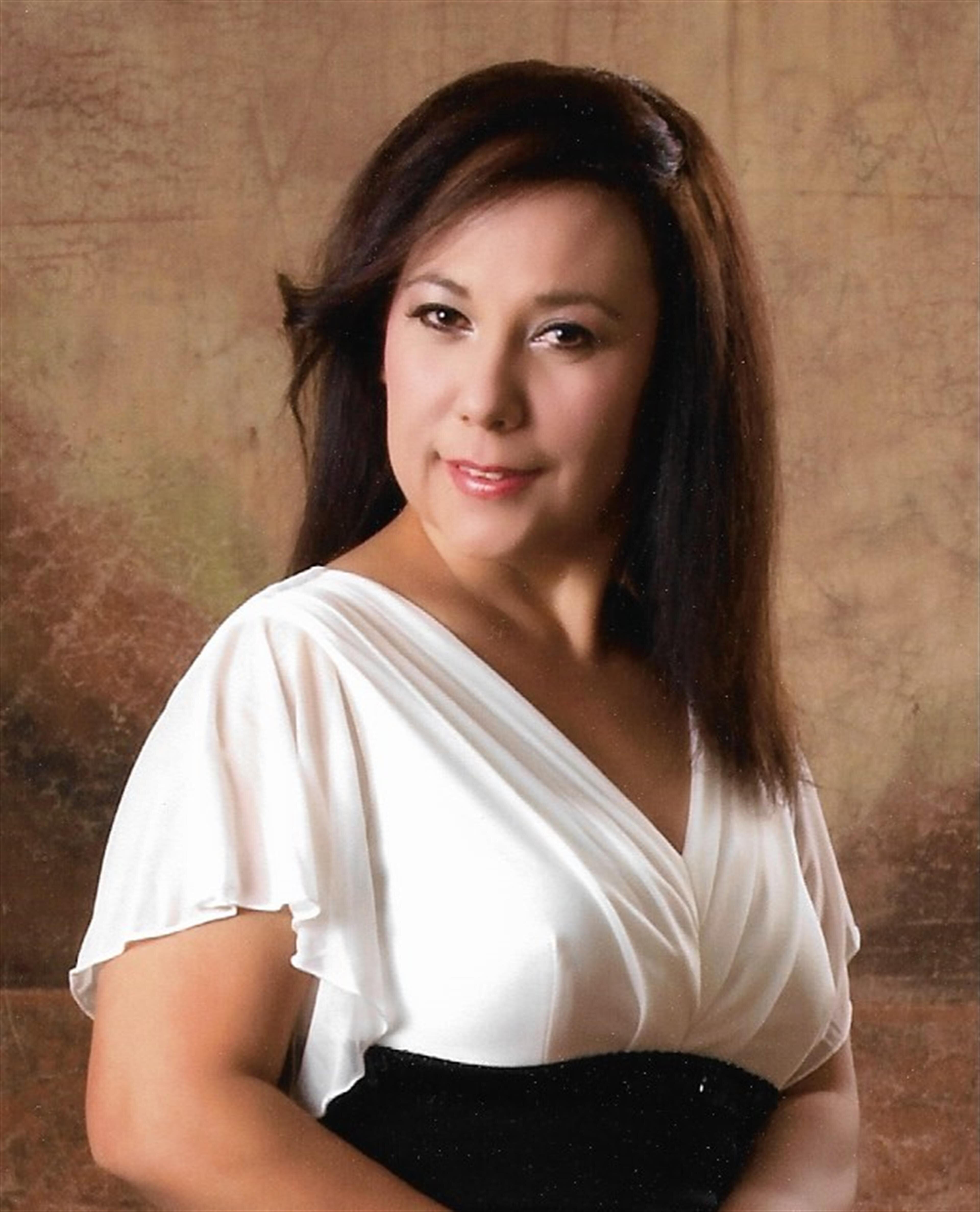 Maria Isabel  De la Garza