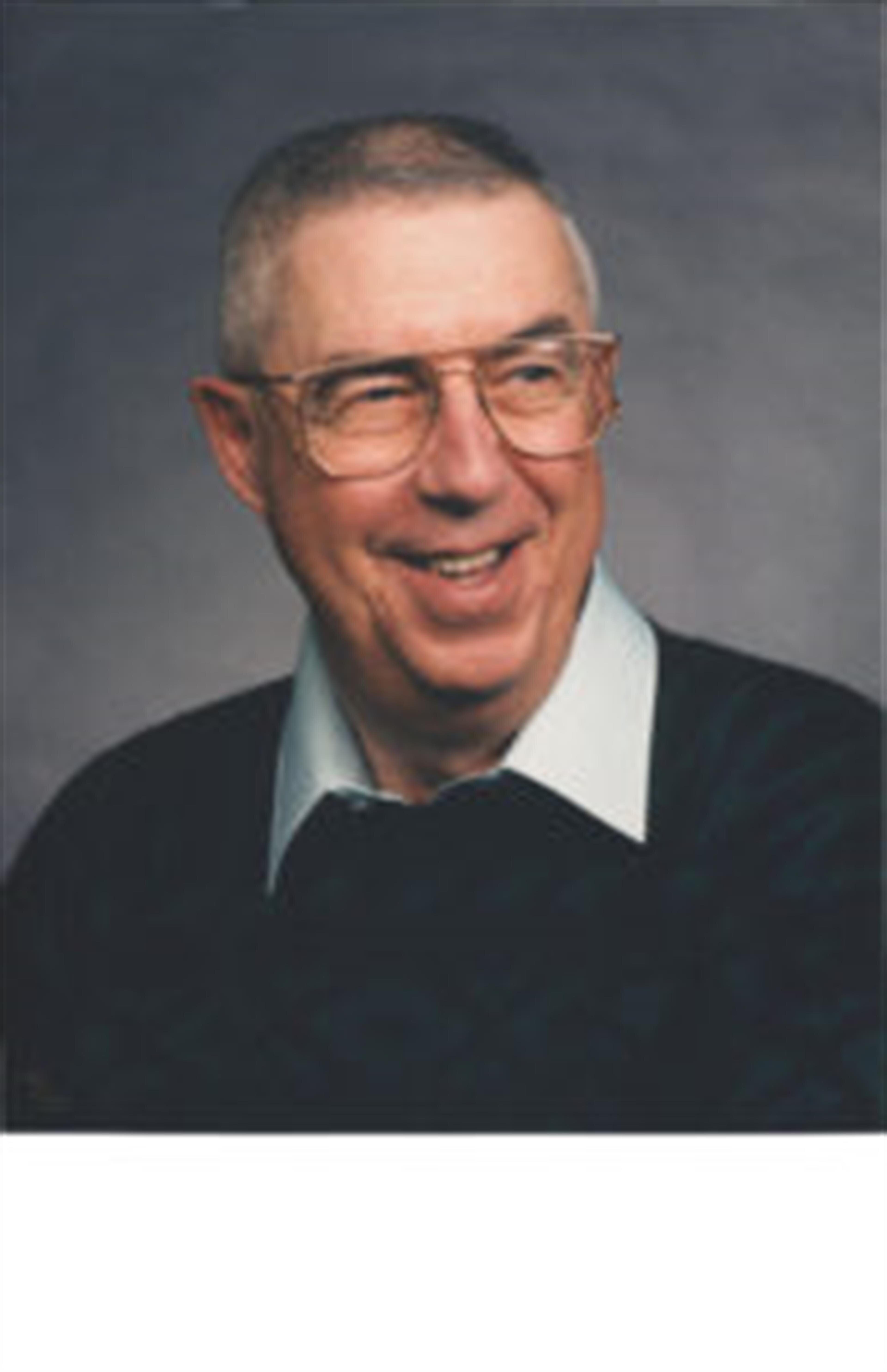JAMES (JIM) E. HALLOCK