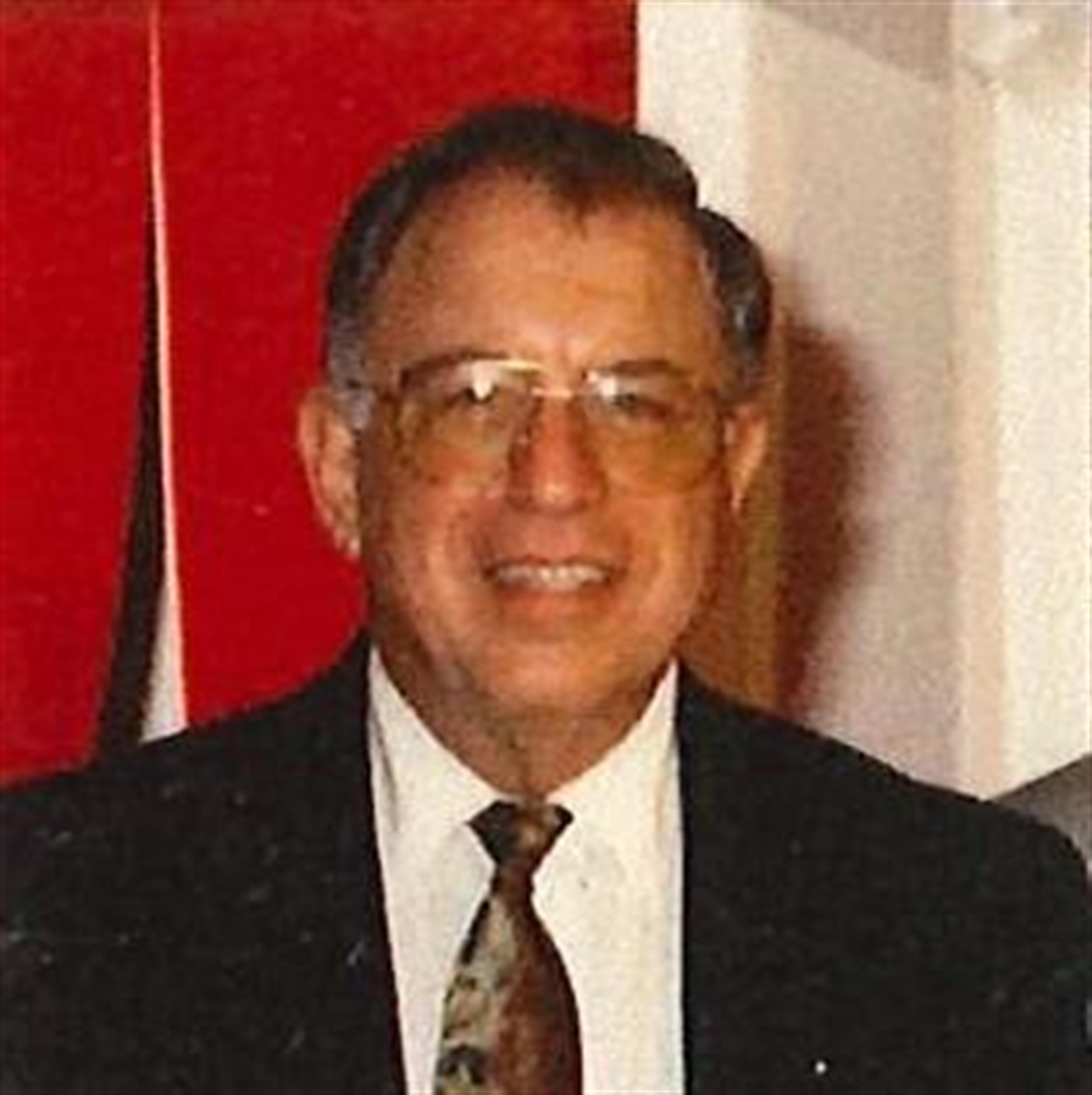 Charles J. "Buddy" Courshon
