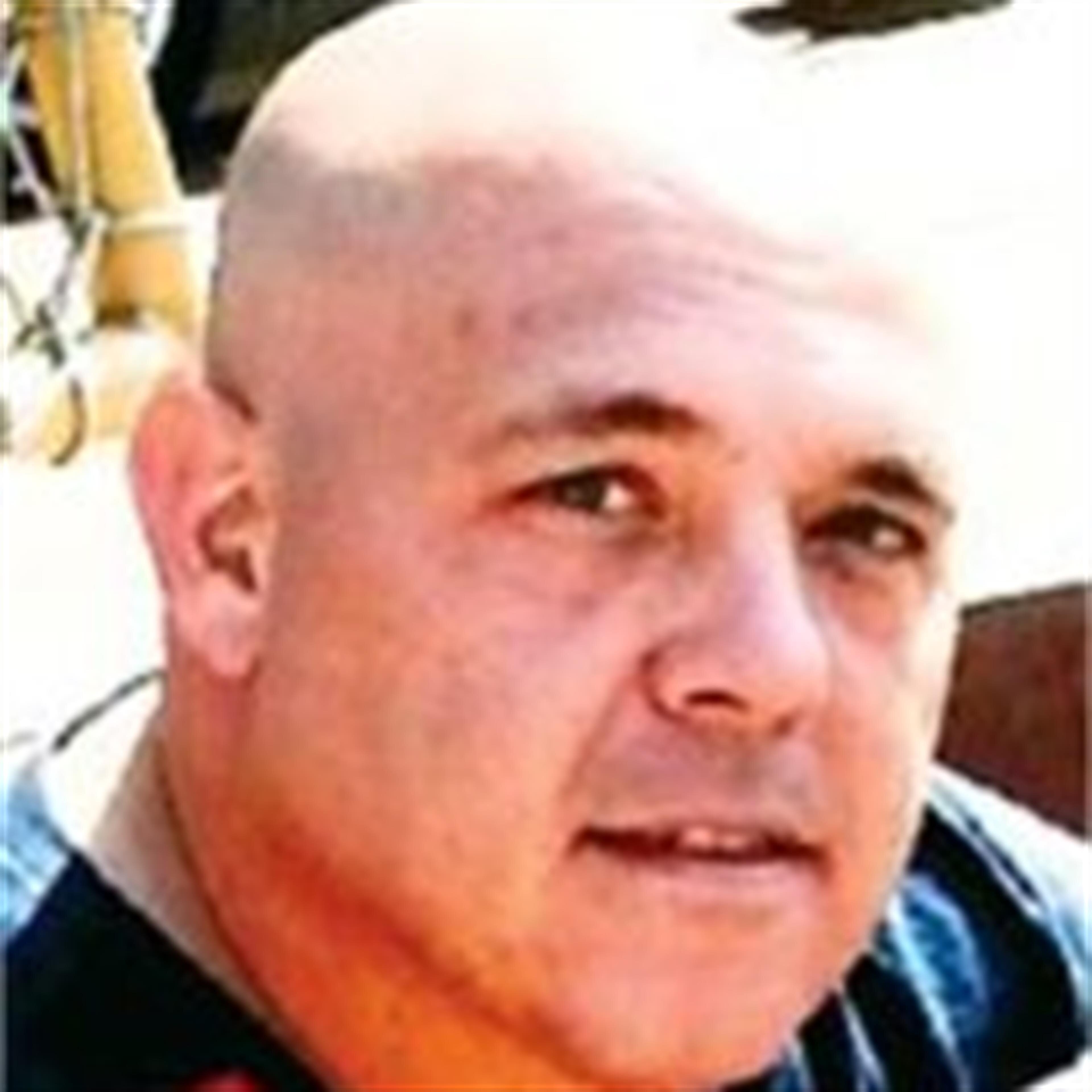 Dustin L. Wade
