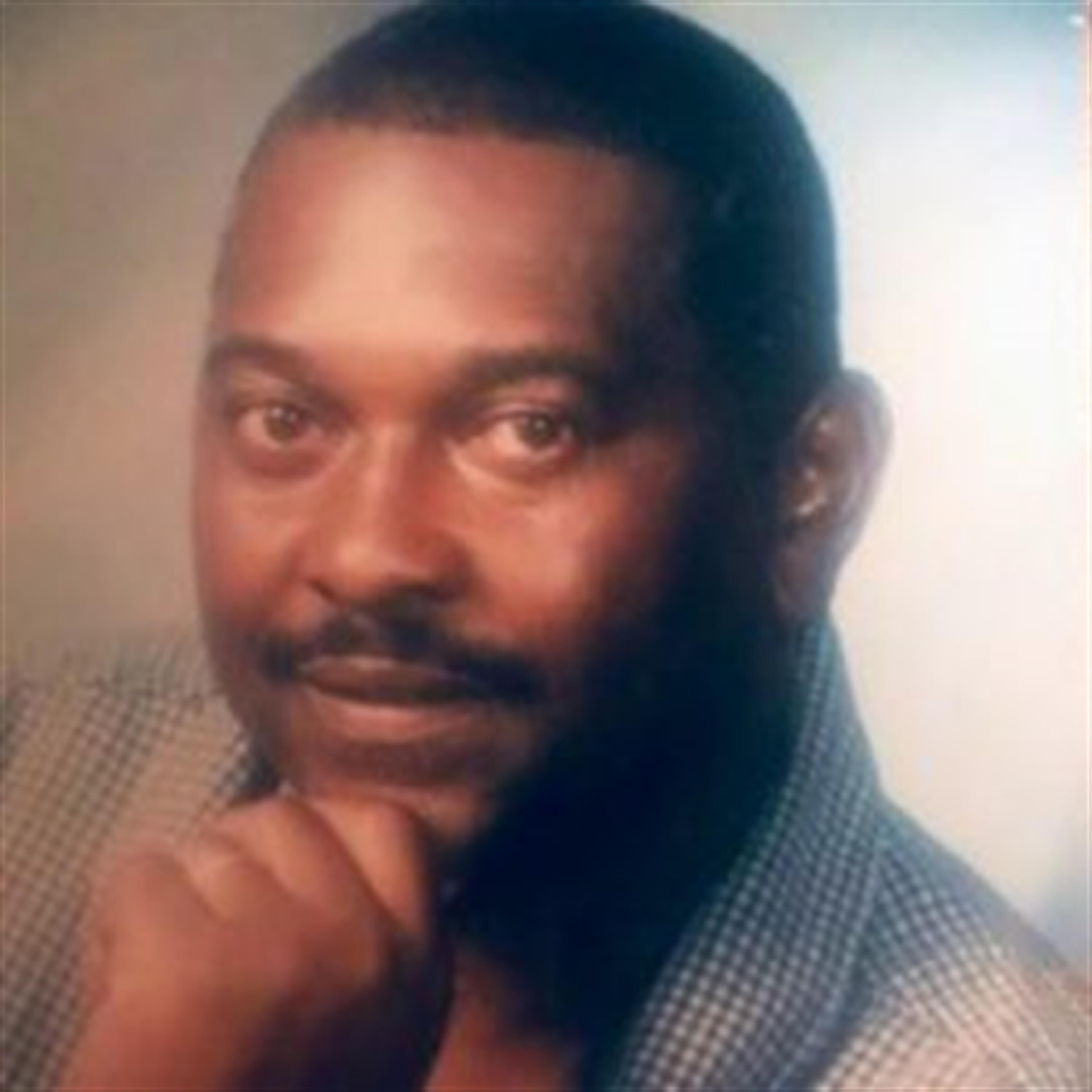 Reginal B. Washington Sr. "Reggie"