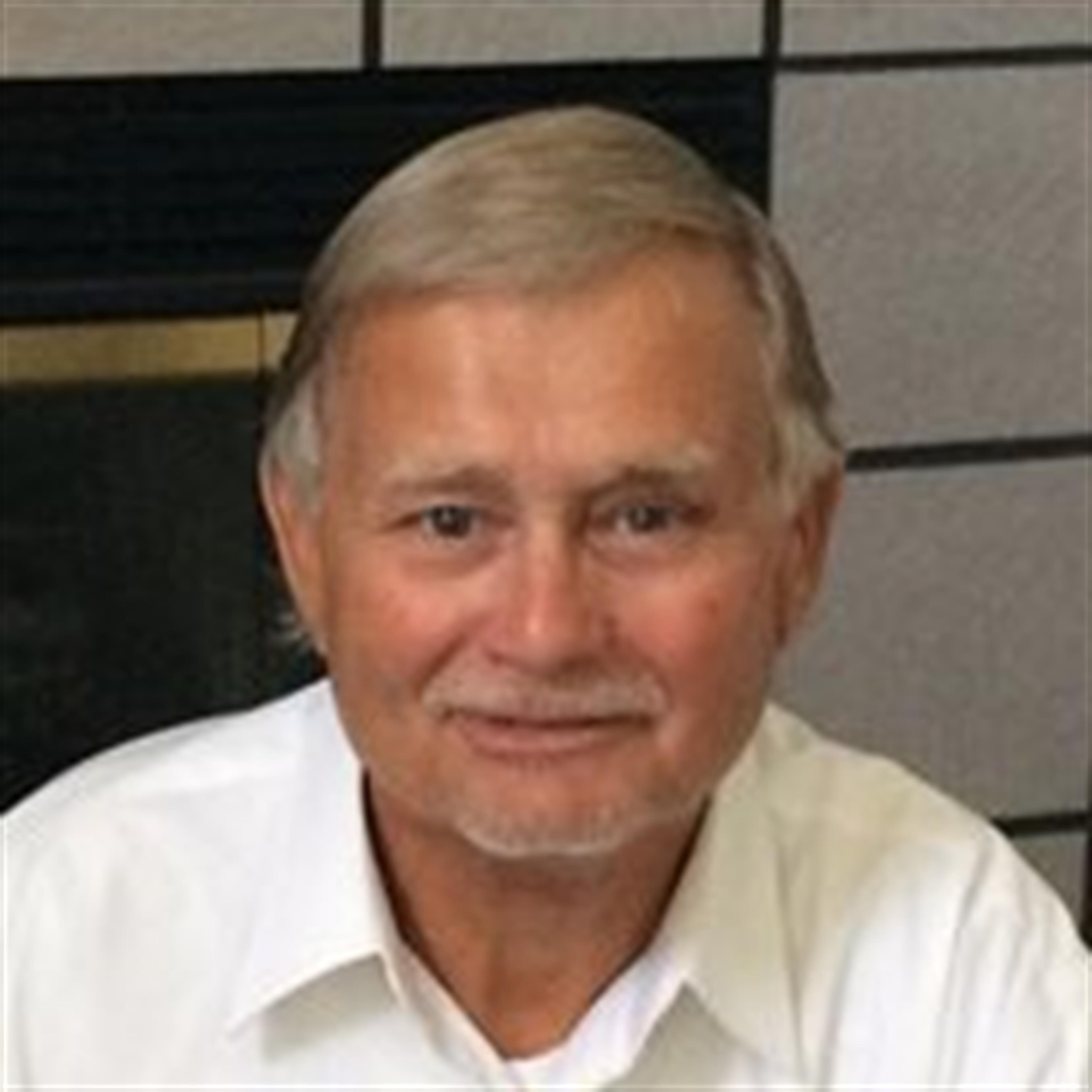 Mr. Lester  Gene  Elliott