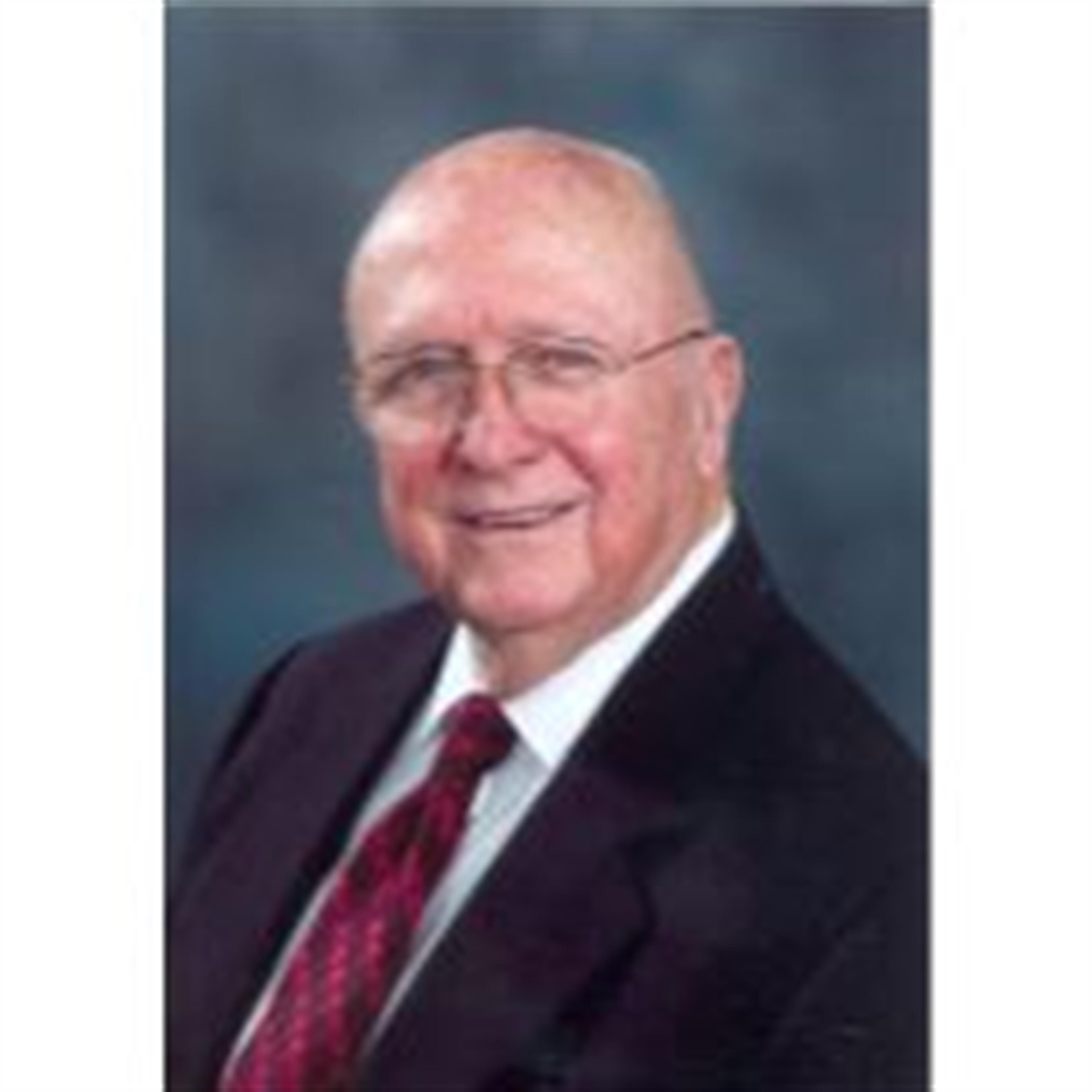J. Fred White