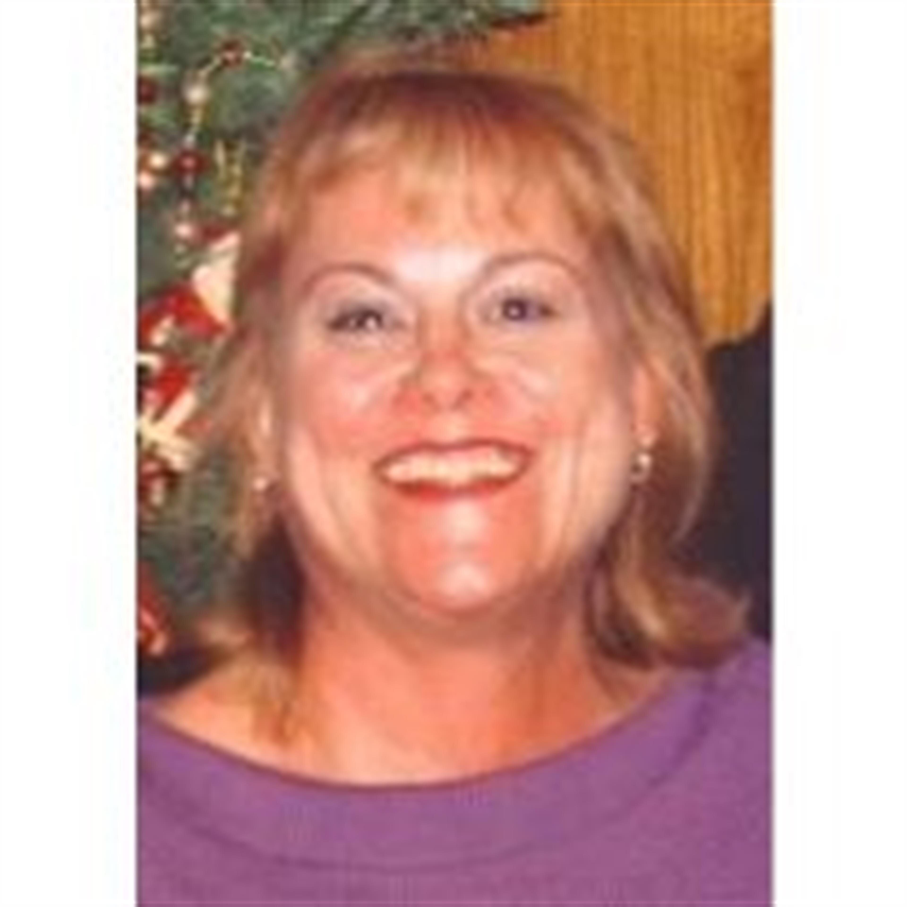 Katharine E. Threat
