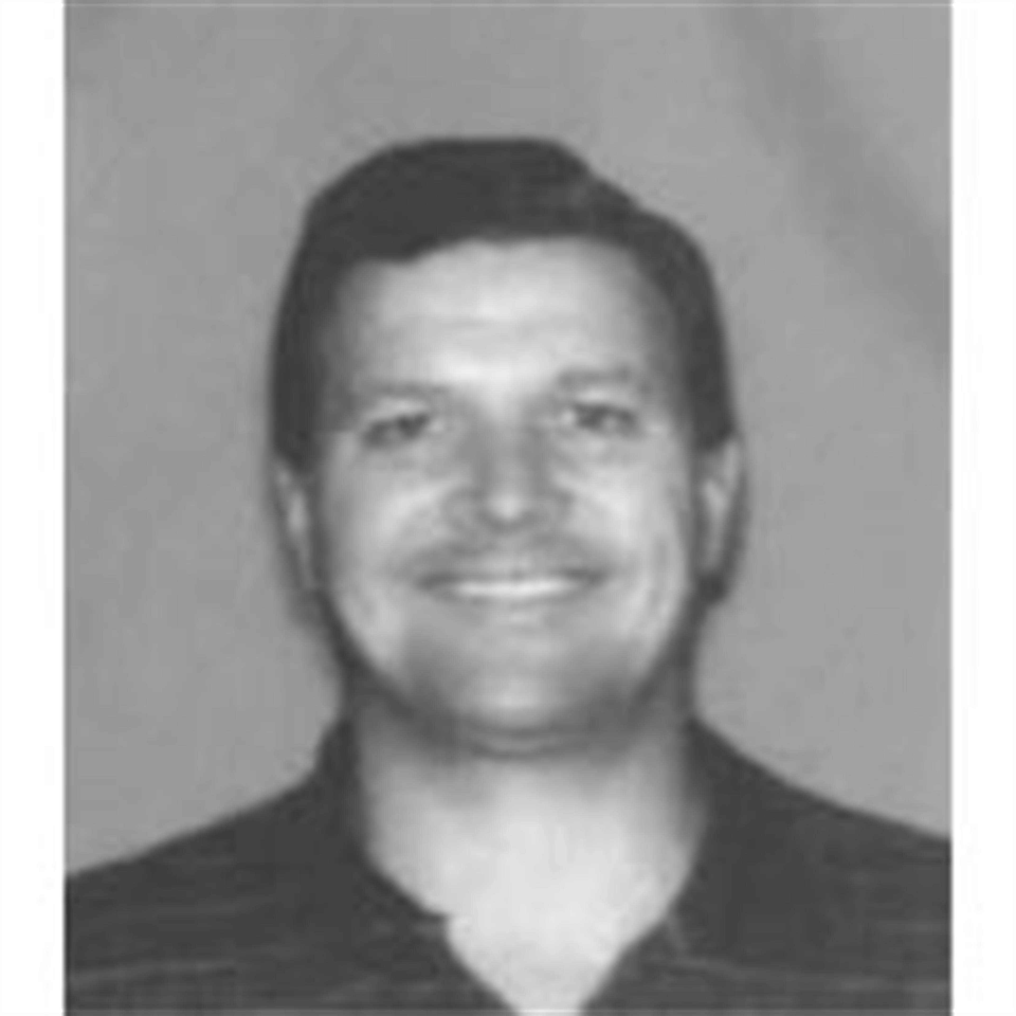 Mr. Donald Cameron Woolf