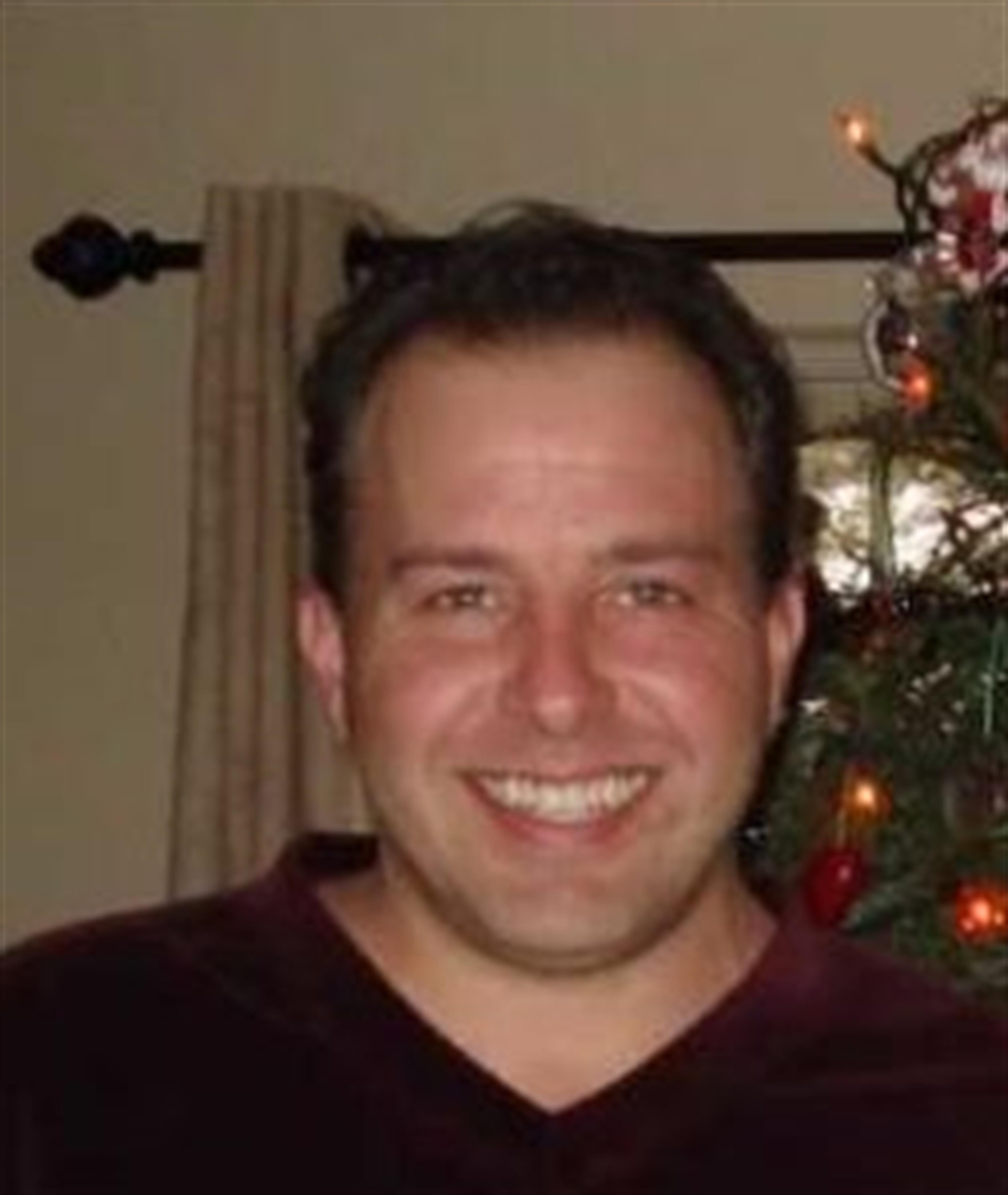 Brent E. Fisher