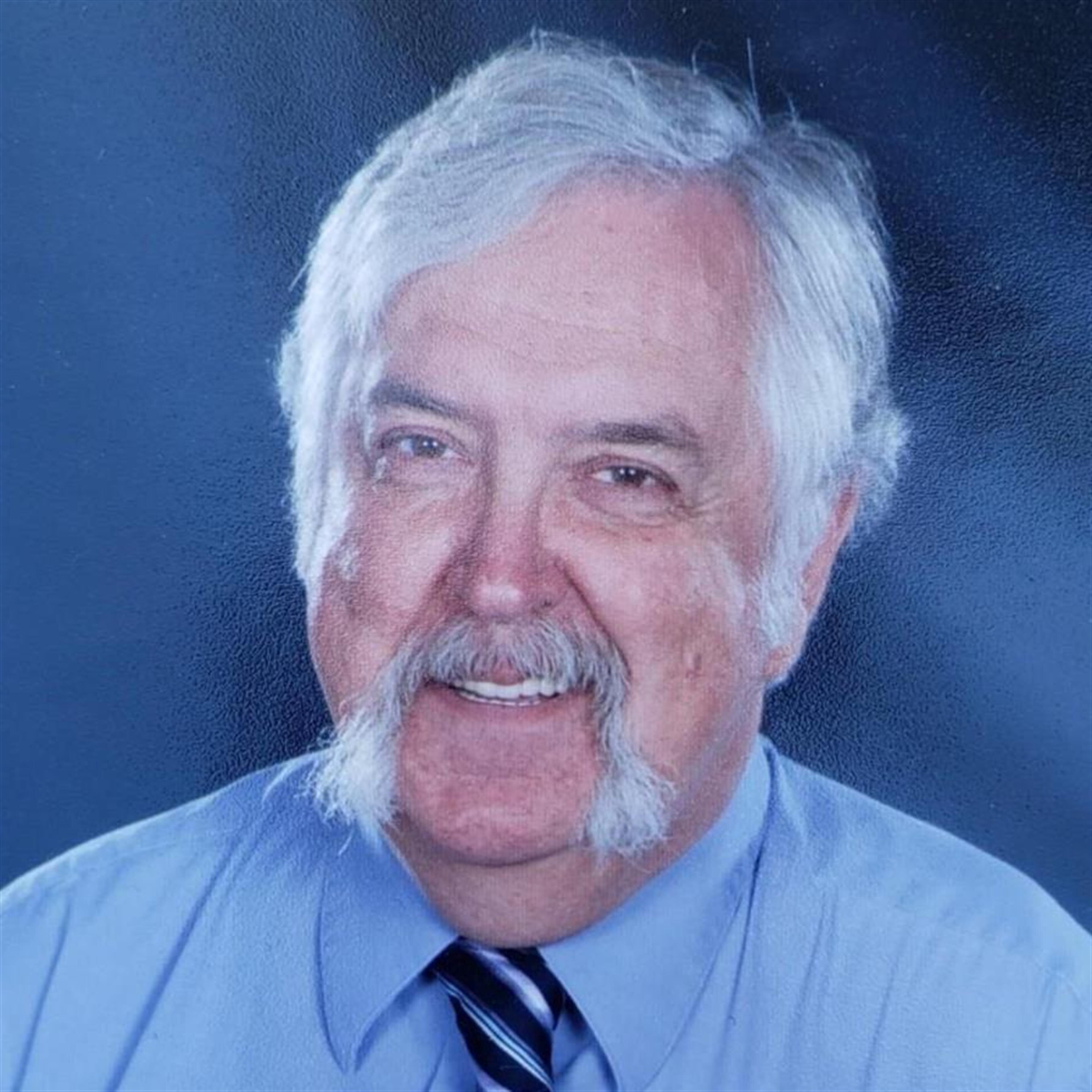 Thomas E. "Tom" Bell