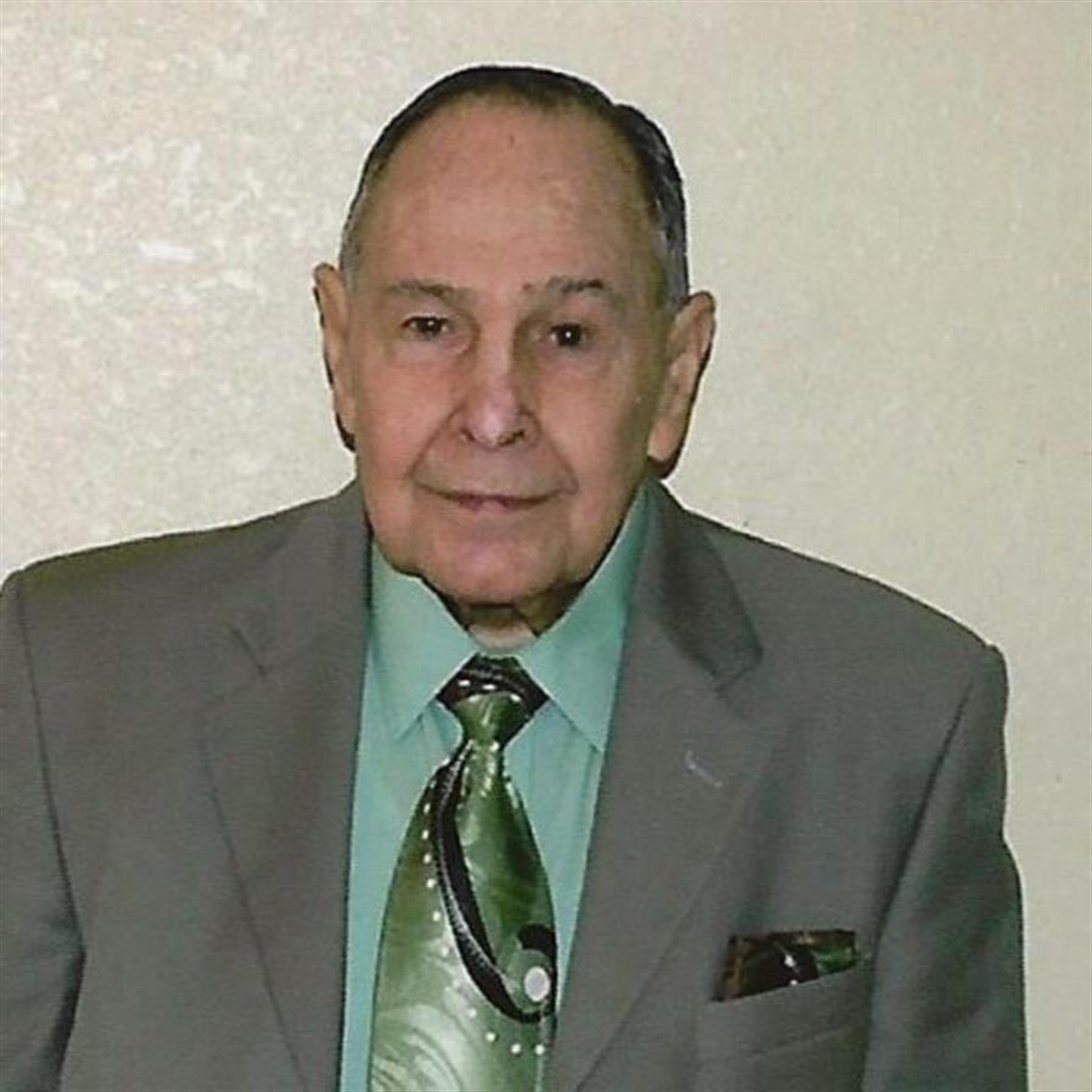 Robert L Akins