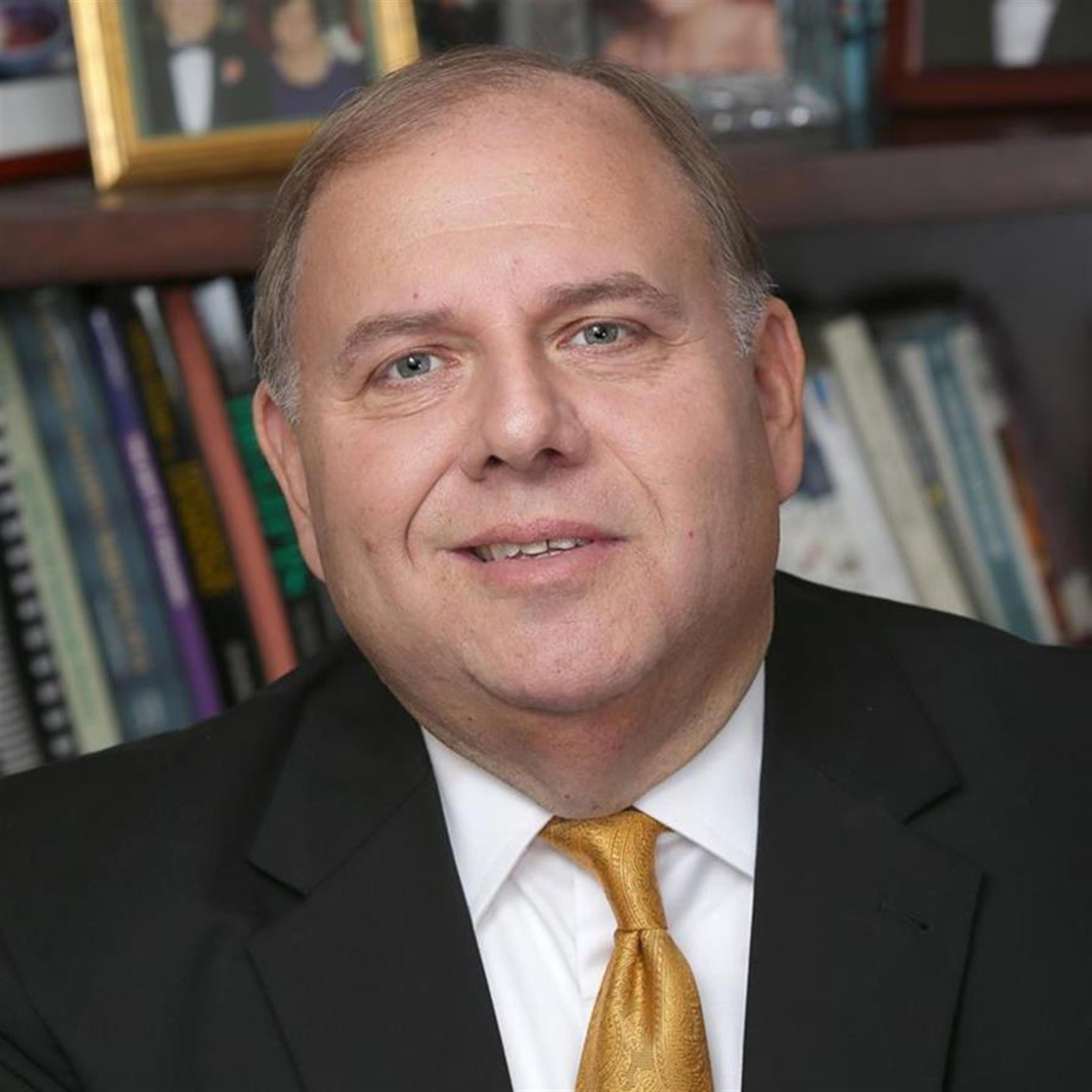 Dr. Dennis R. DePerro