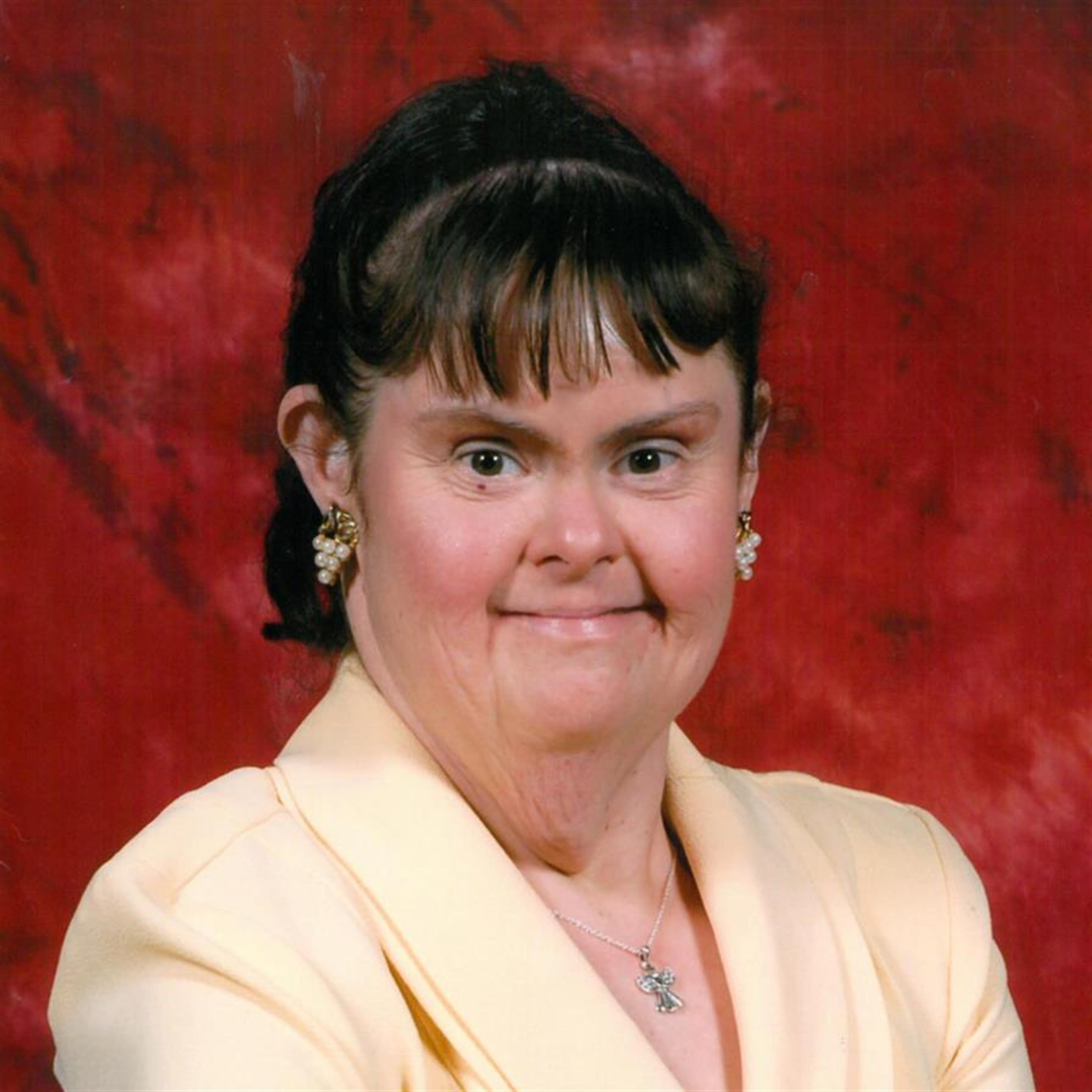 Michele E. "Mimi" Navilhon