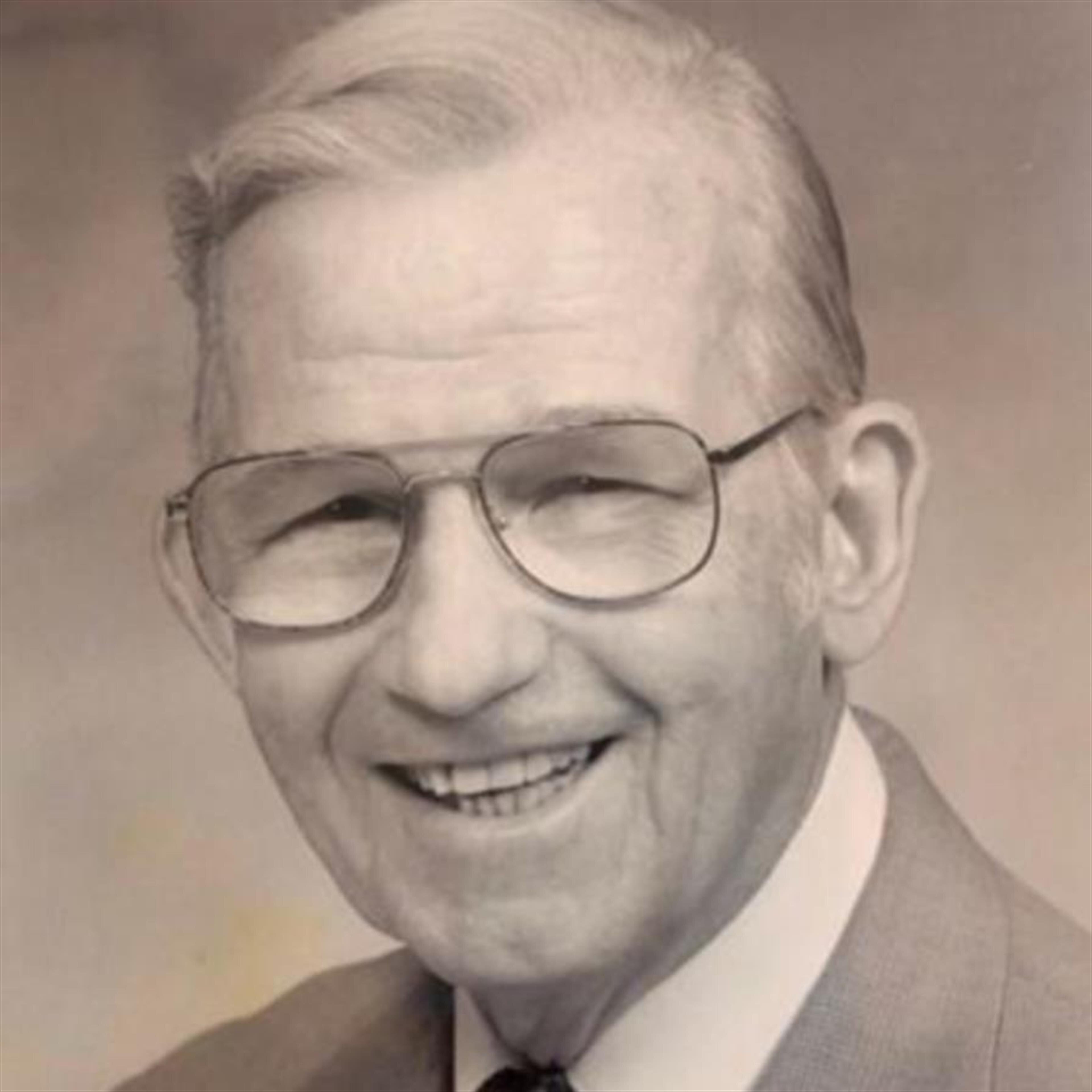 Dr. Charles M. Tipton