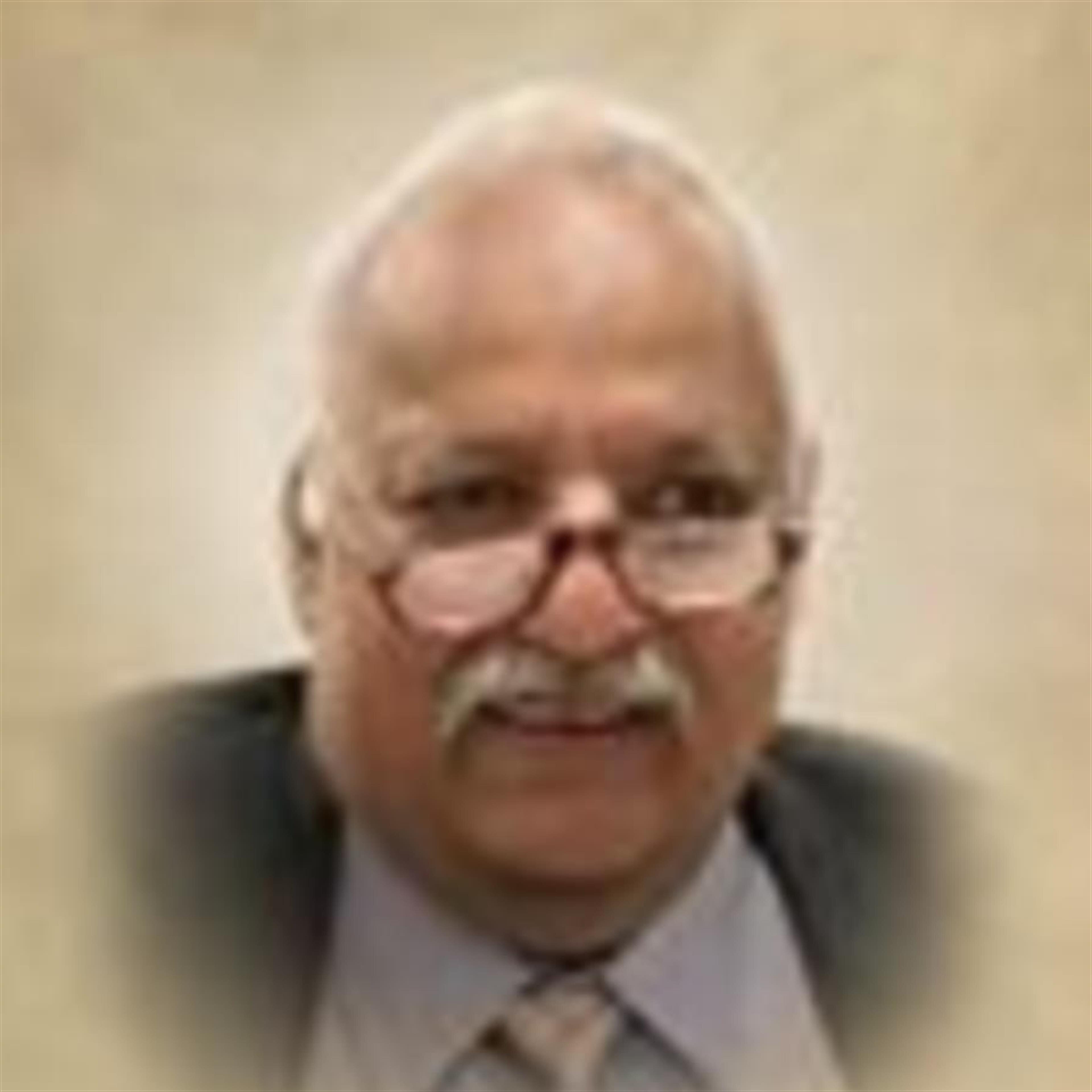 Dr. Pooran Chand Barman