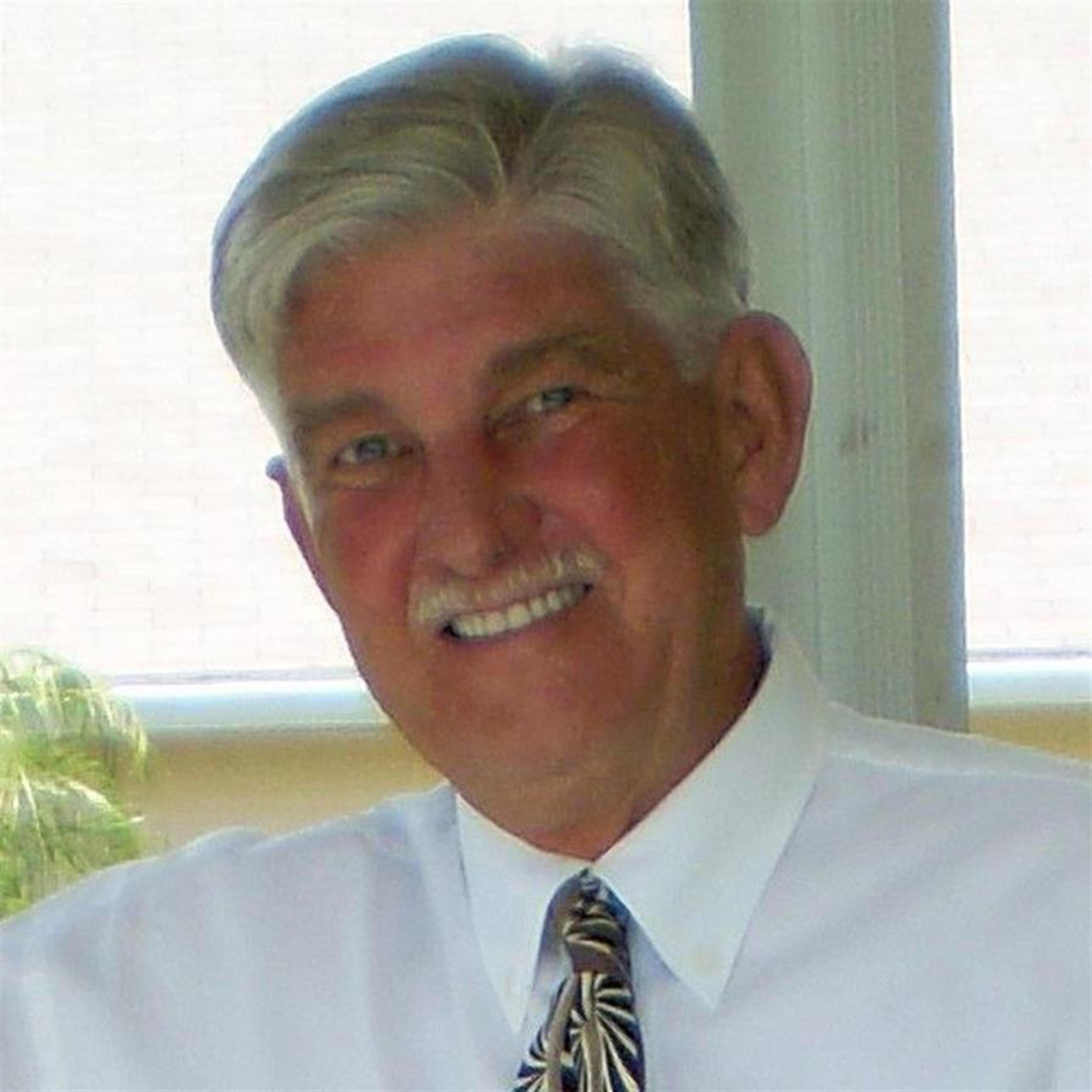 Paul E Schmotzer