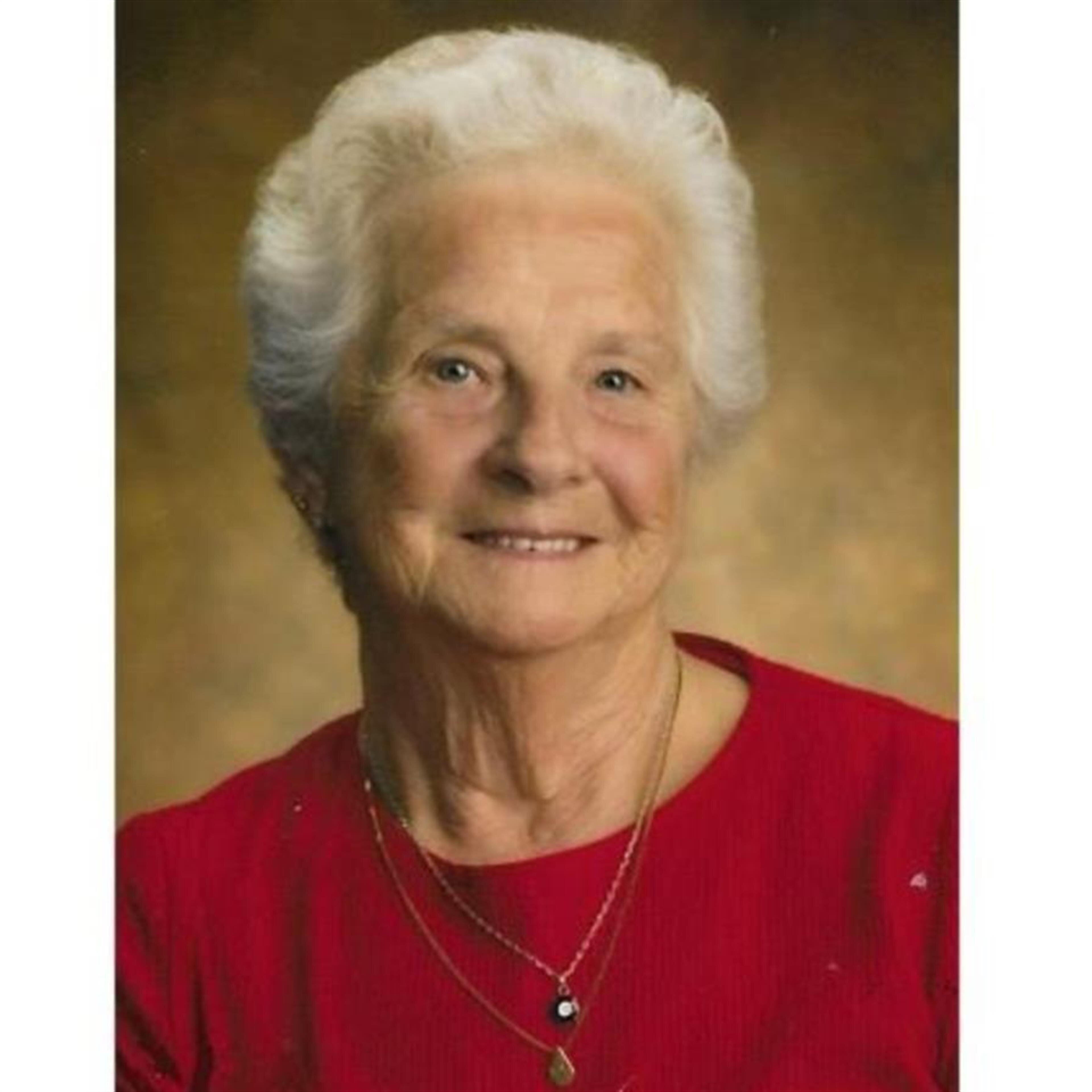 A. Nadine Mudge