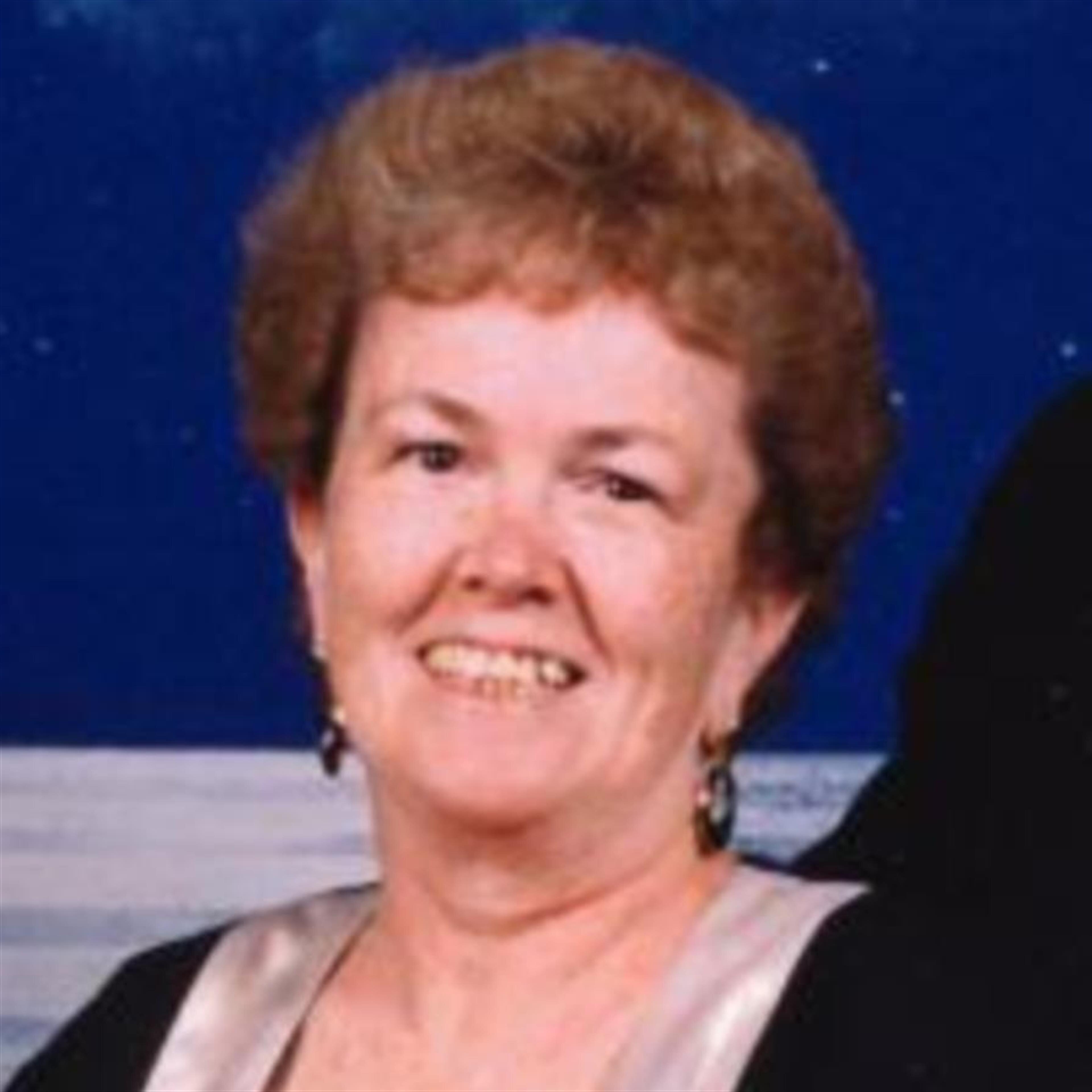 Edna M. Helmick