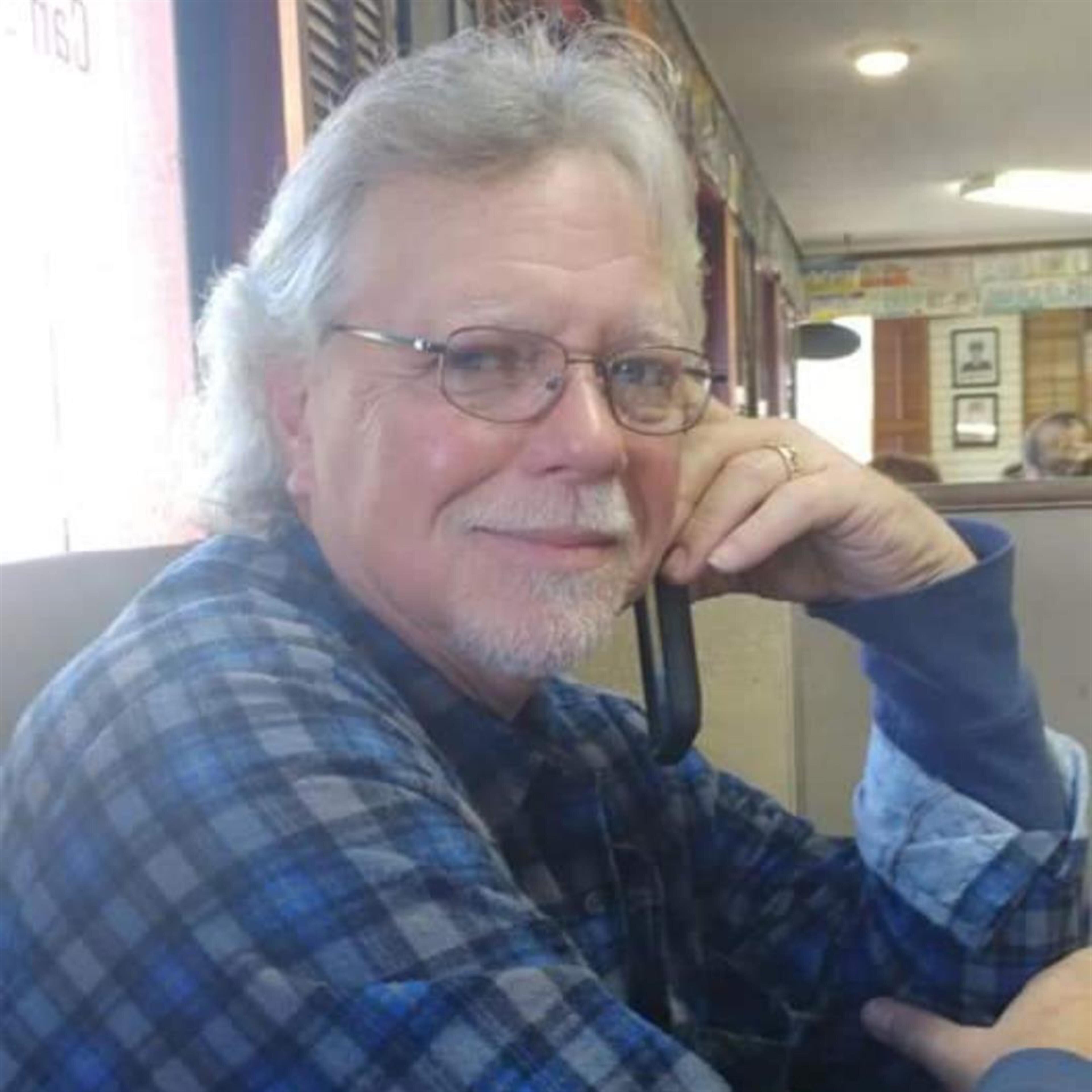 James E. "Hank"  Nixon