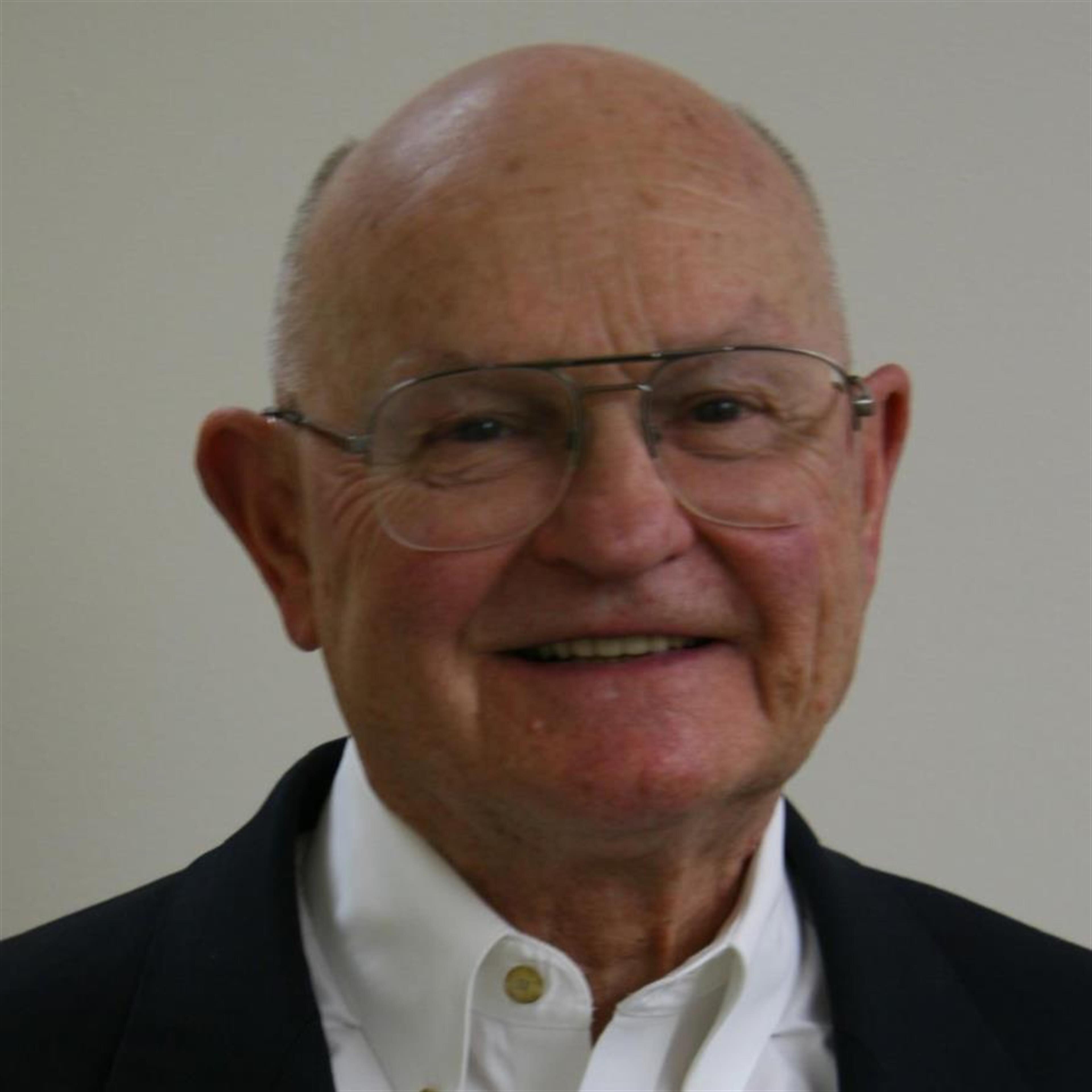 J A "Jim" Bricker