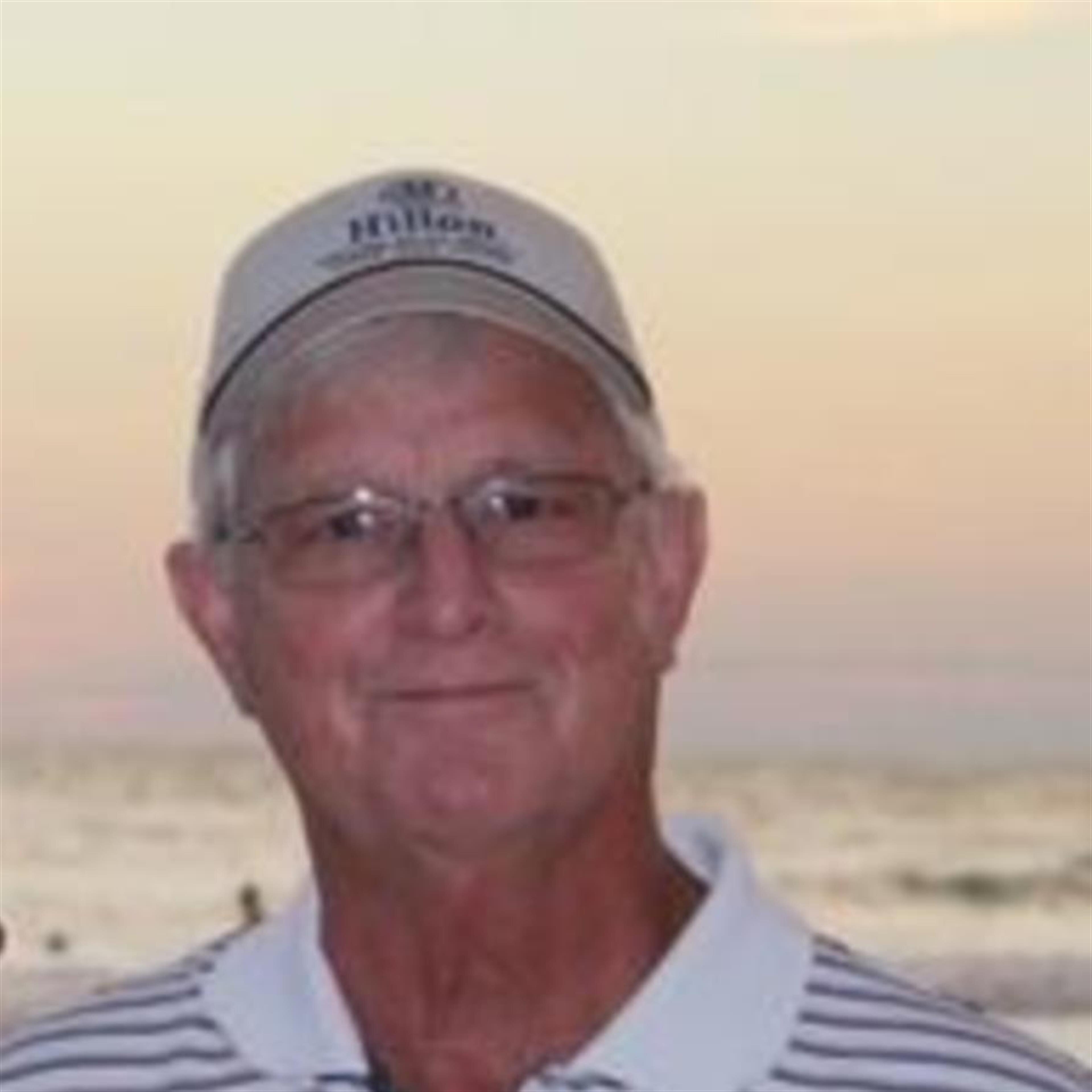 Dennis E Hall