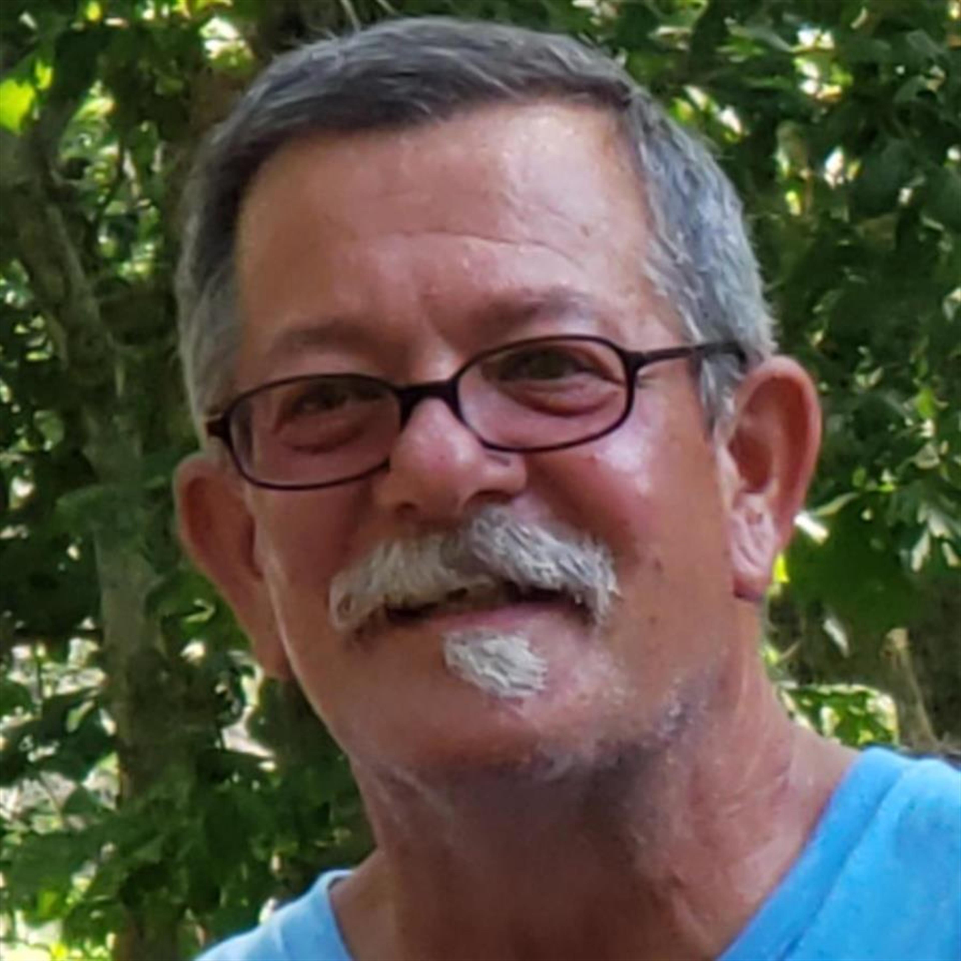 Richard "Dick" J. Themas