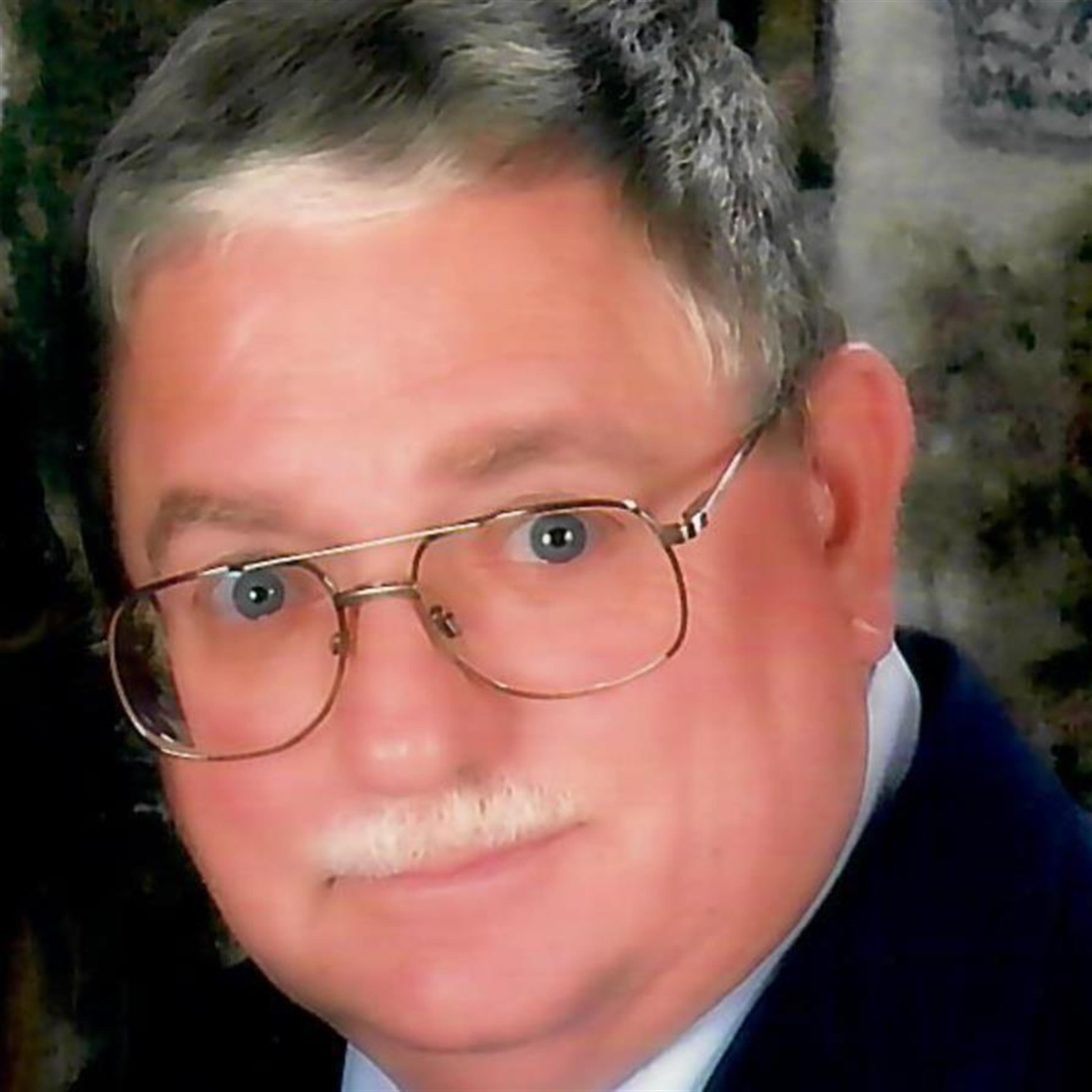 John E Swanson's obituary picture