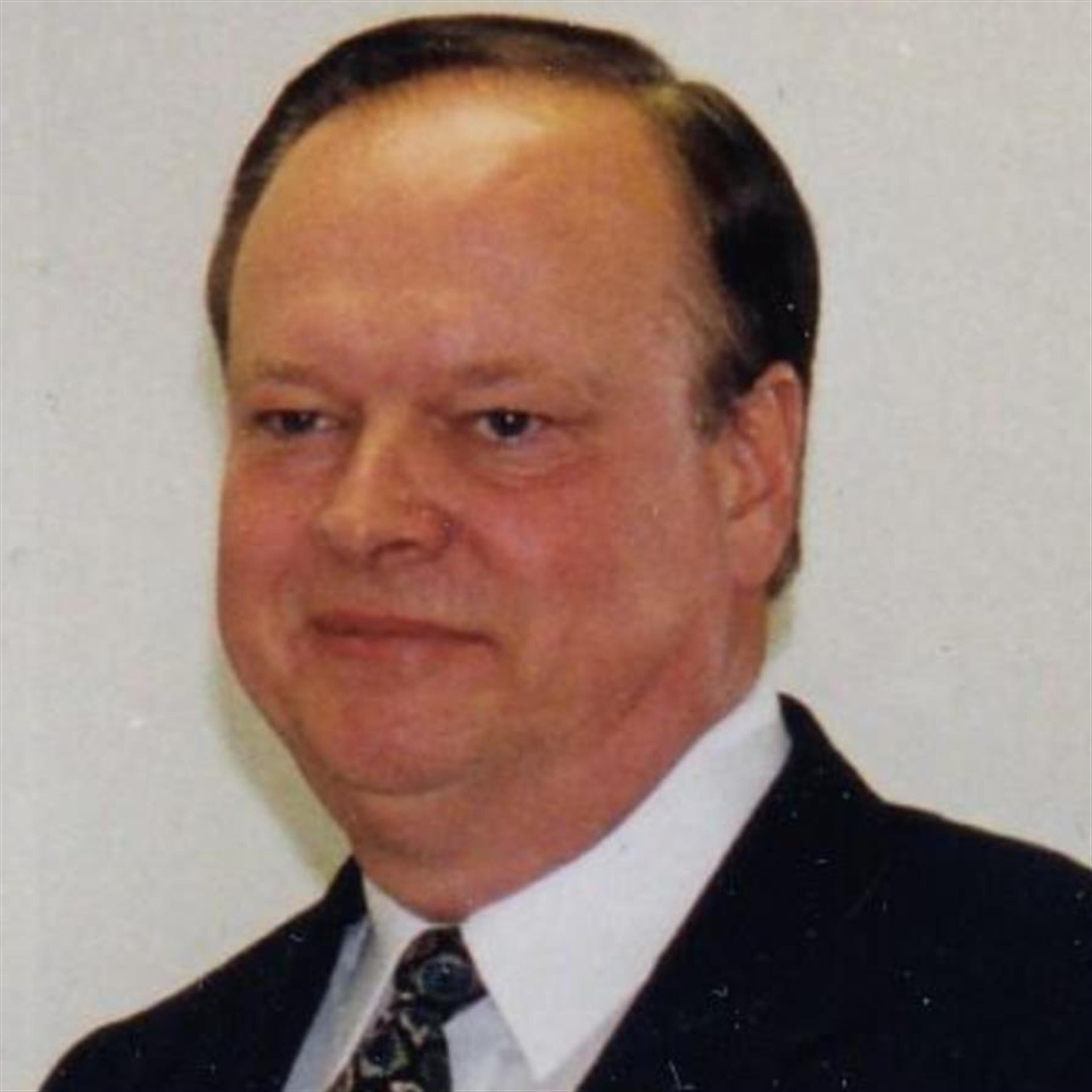 Dr. William L. Watrous