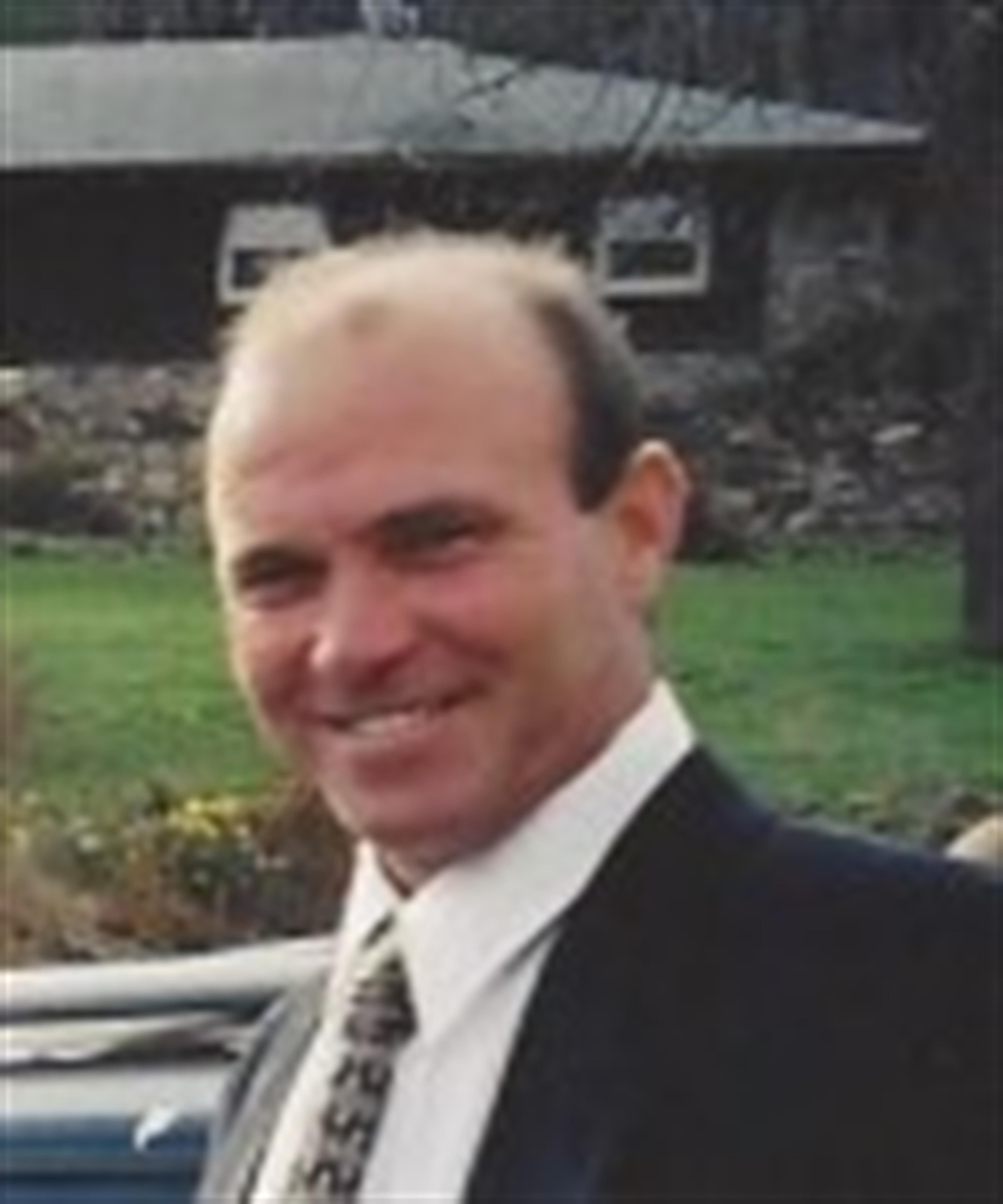 Mark L. Breeden
