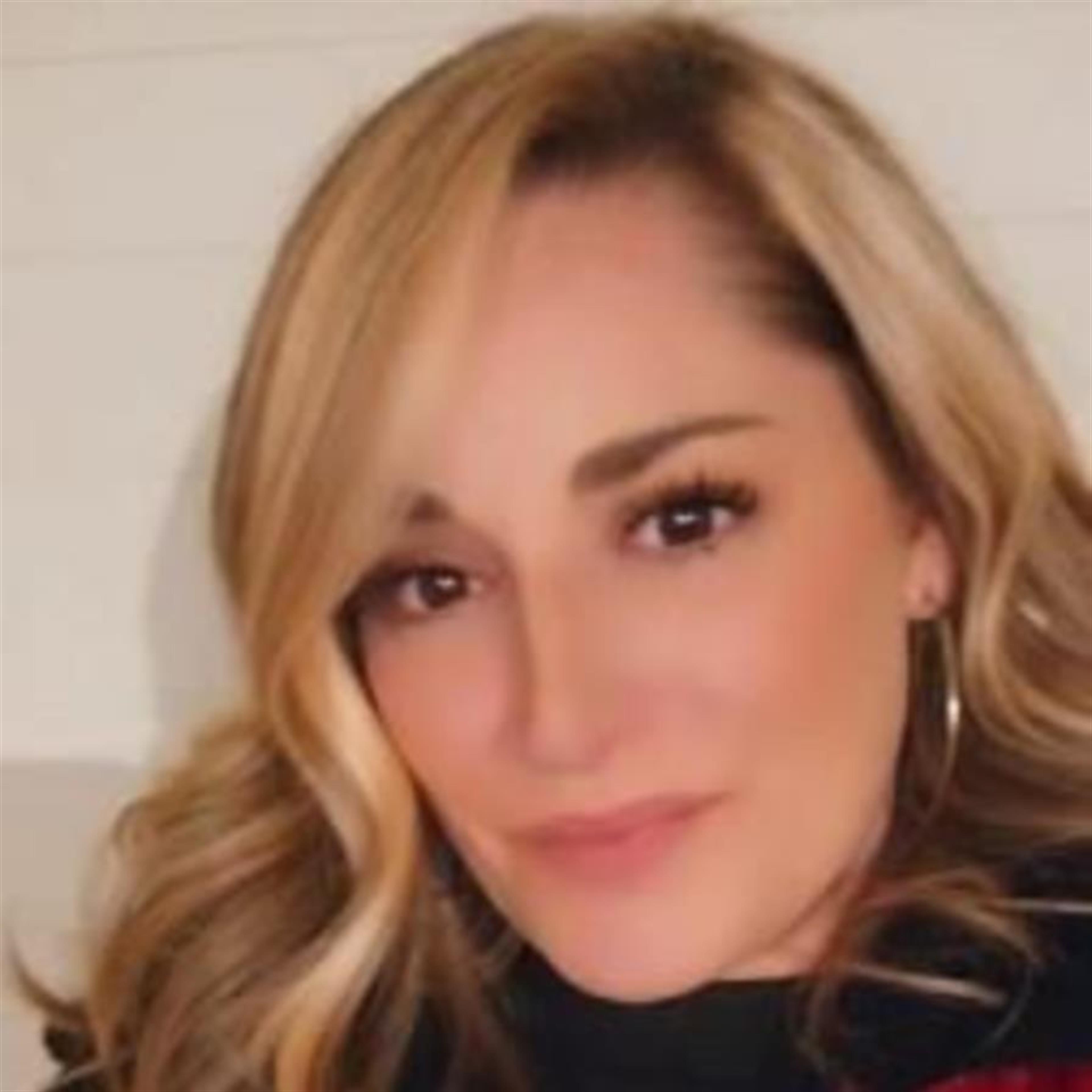 Amanda E. "Mandi" Sharp