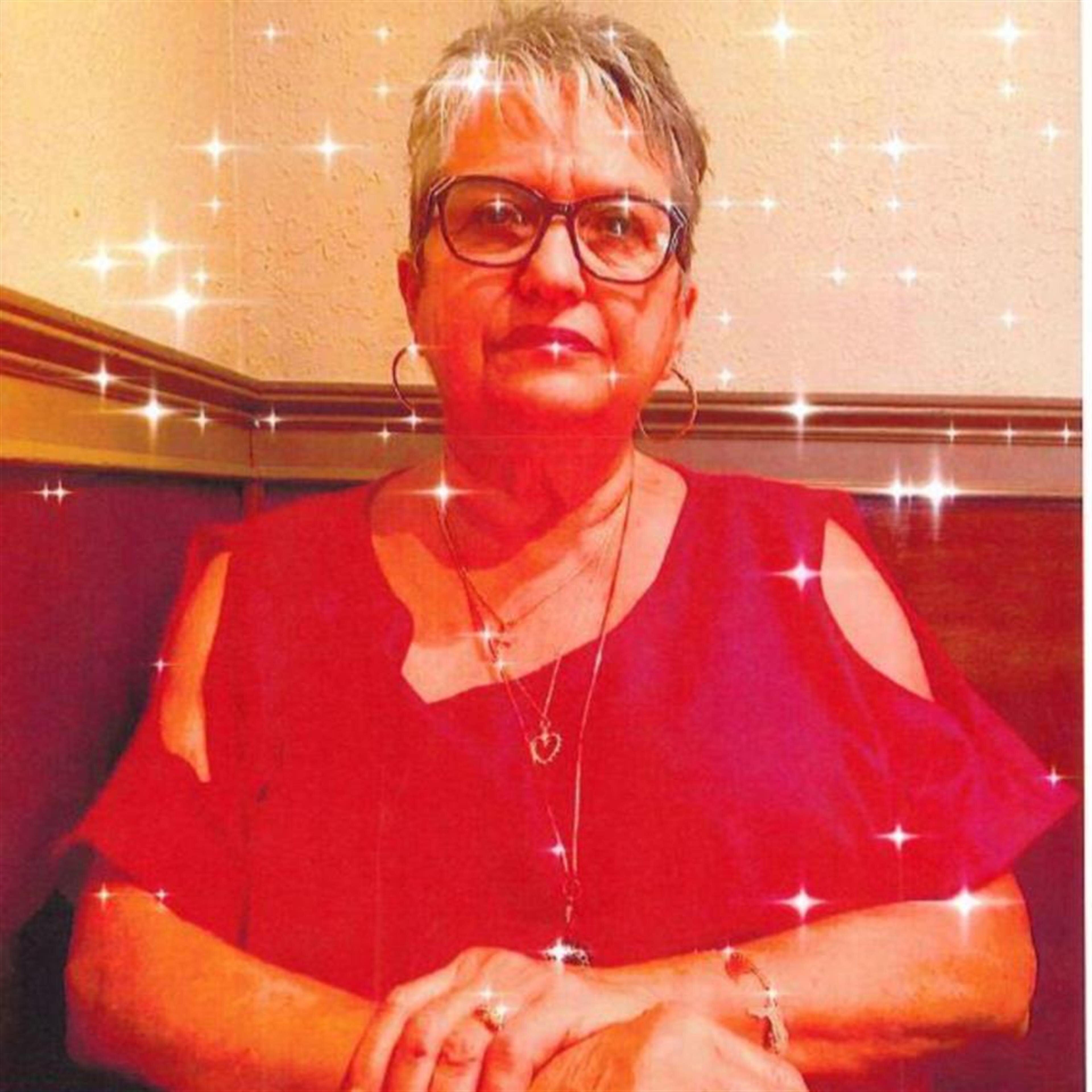 Mrs. Regina E. Ouimette