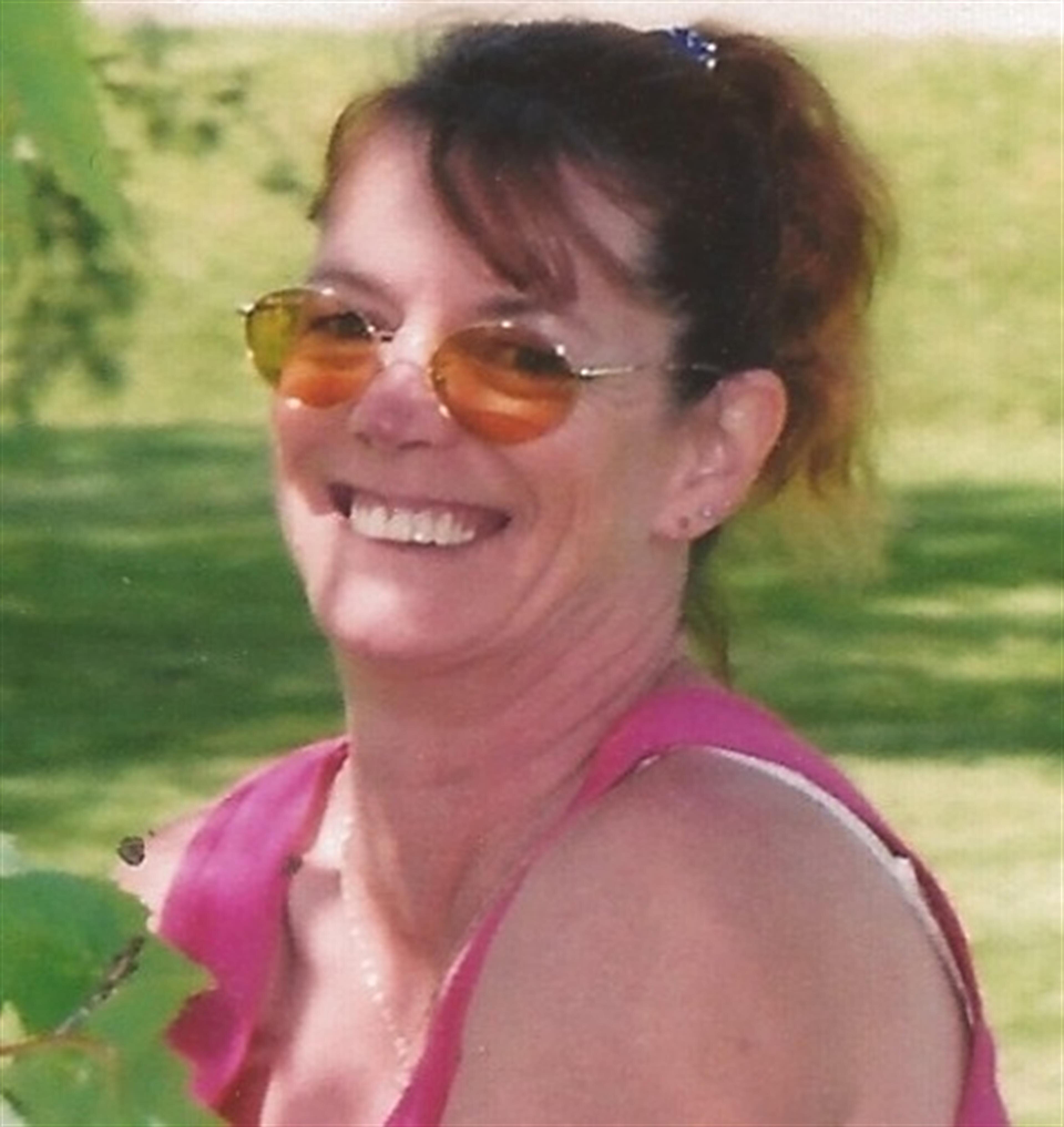 Dora M. Sheck