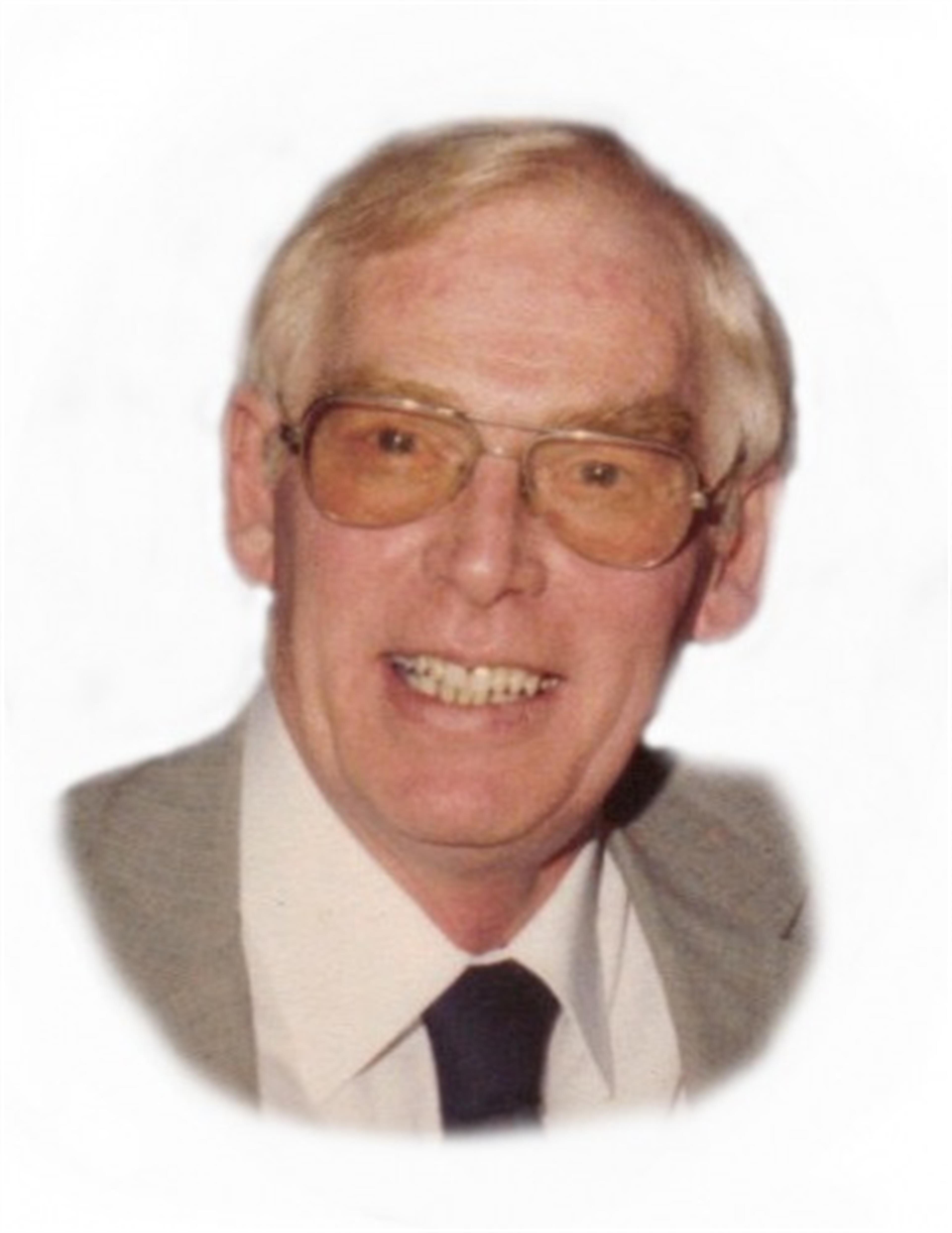 Thomas J. Holton