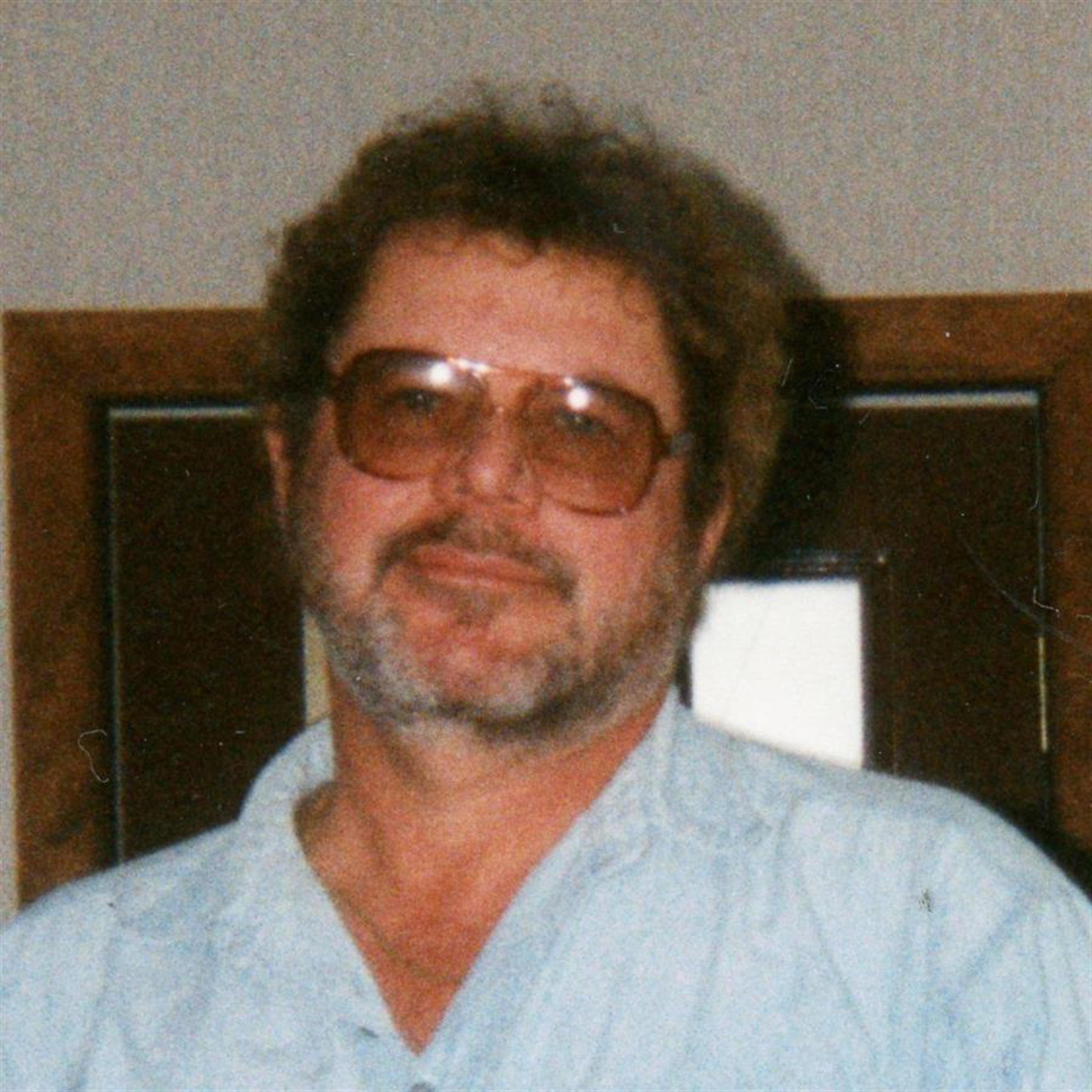 William E. "Bill" Rhodes