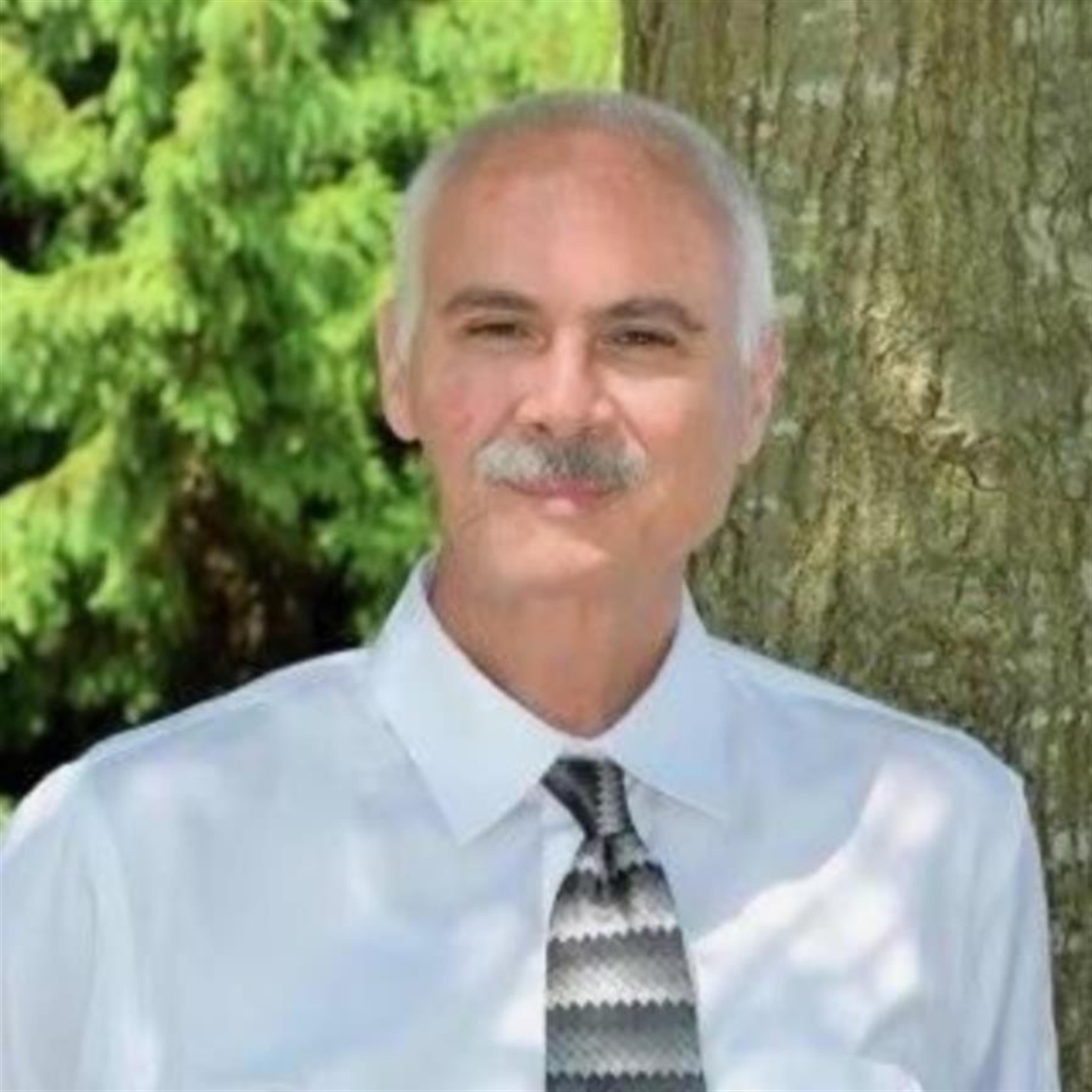Eugene "Gene" Shuttle, Jr.