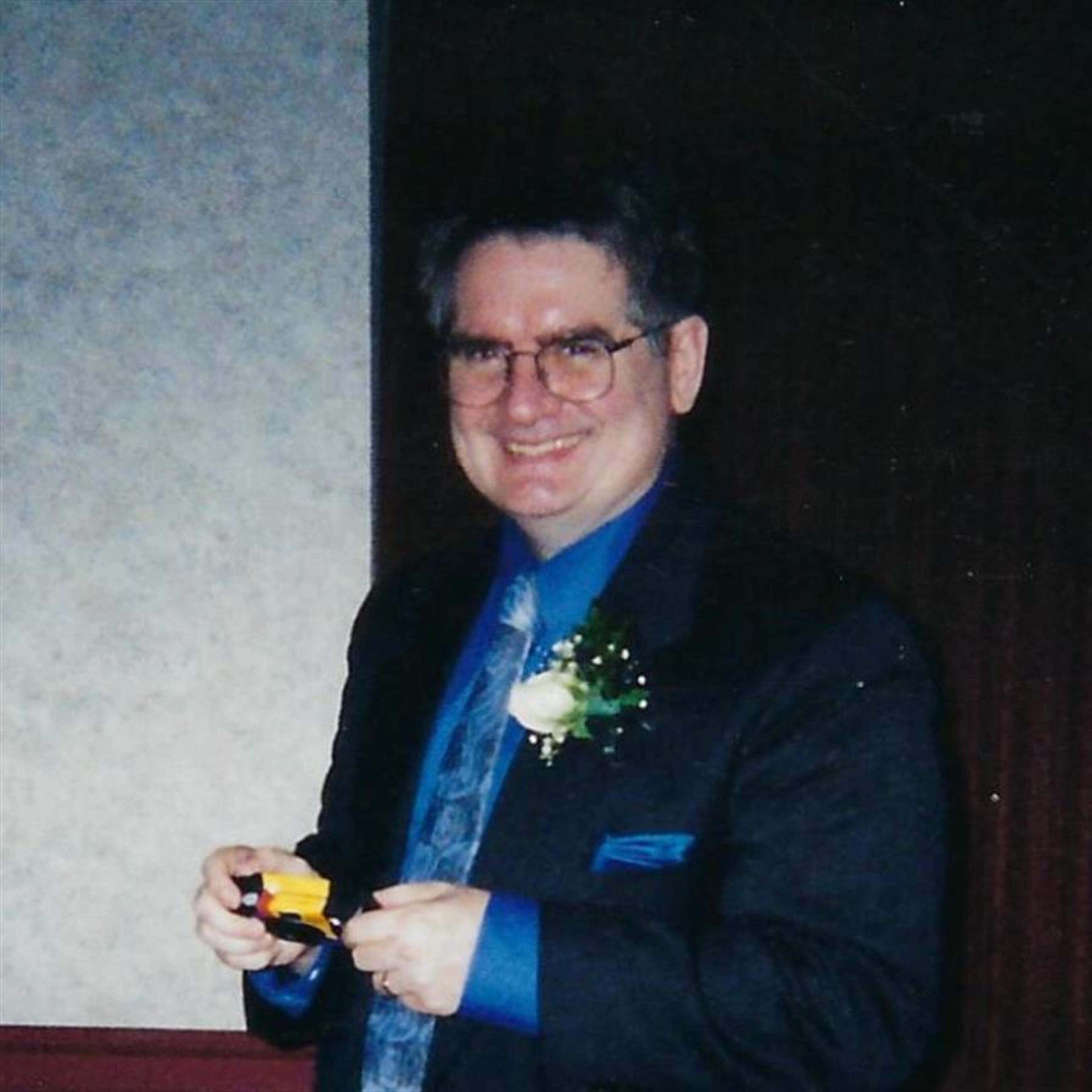 Thomas J Holup