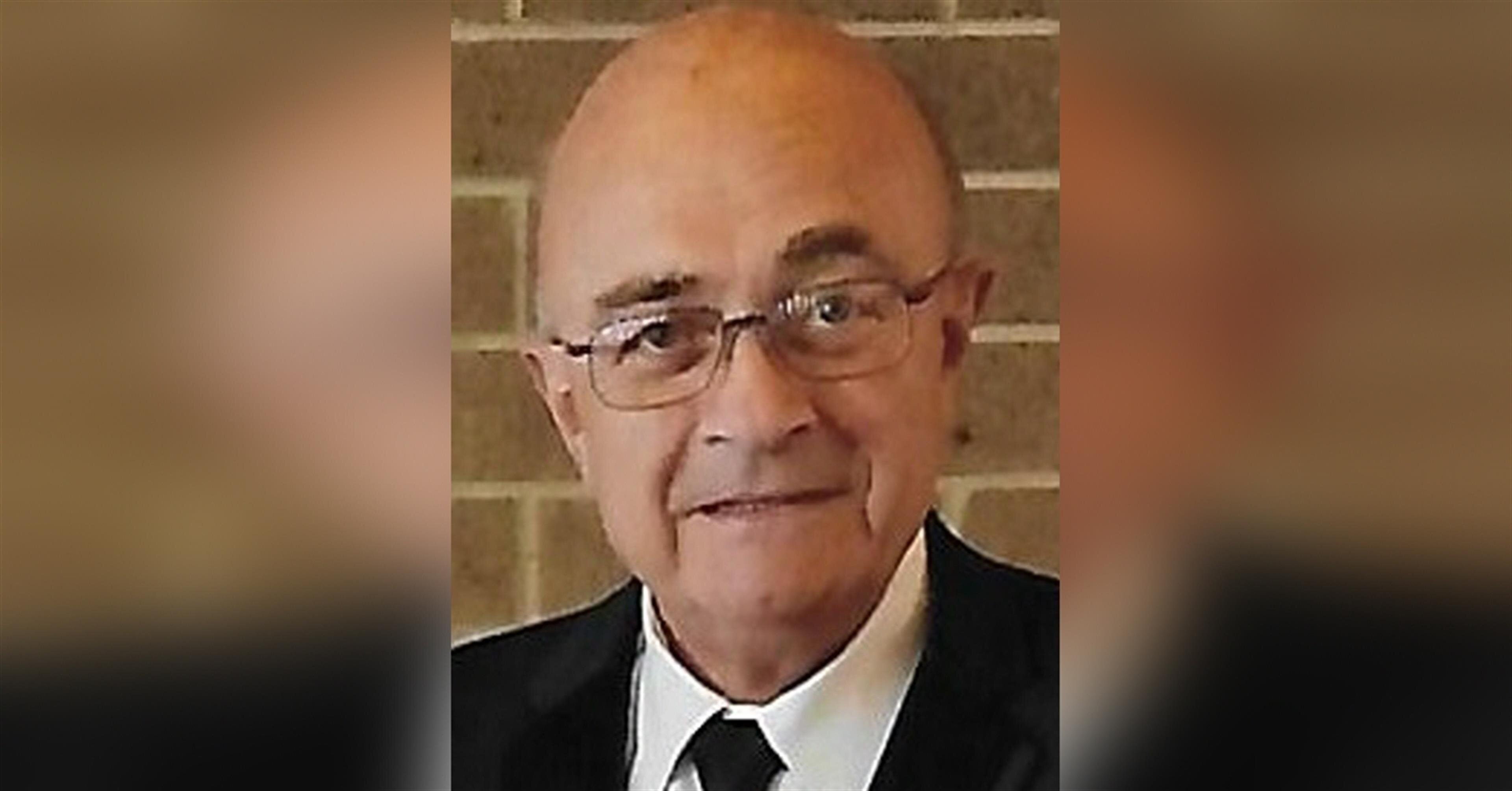John M. Izaj
