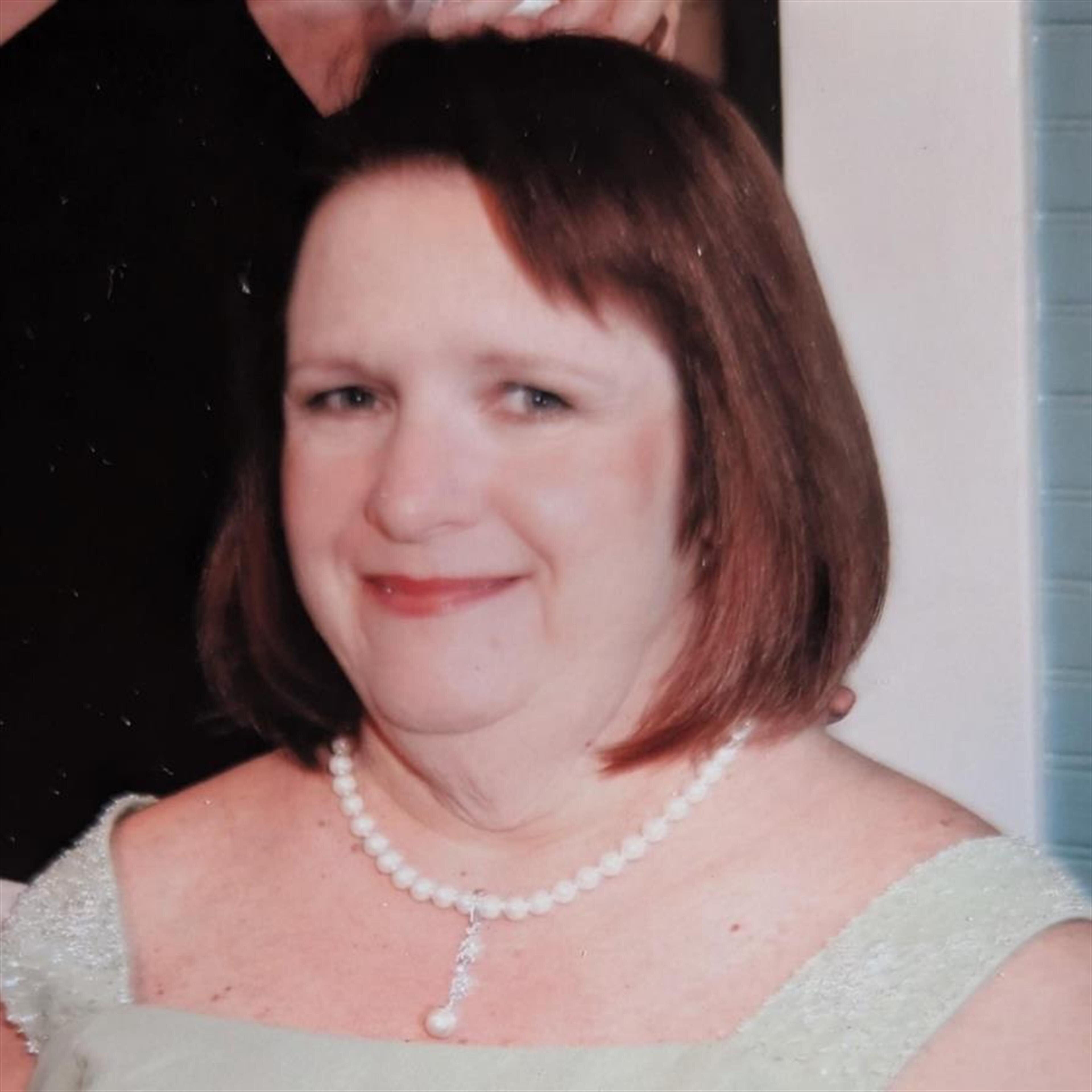 Debra "Debi" Kay Faulkner