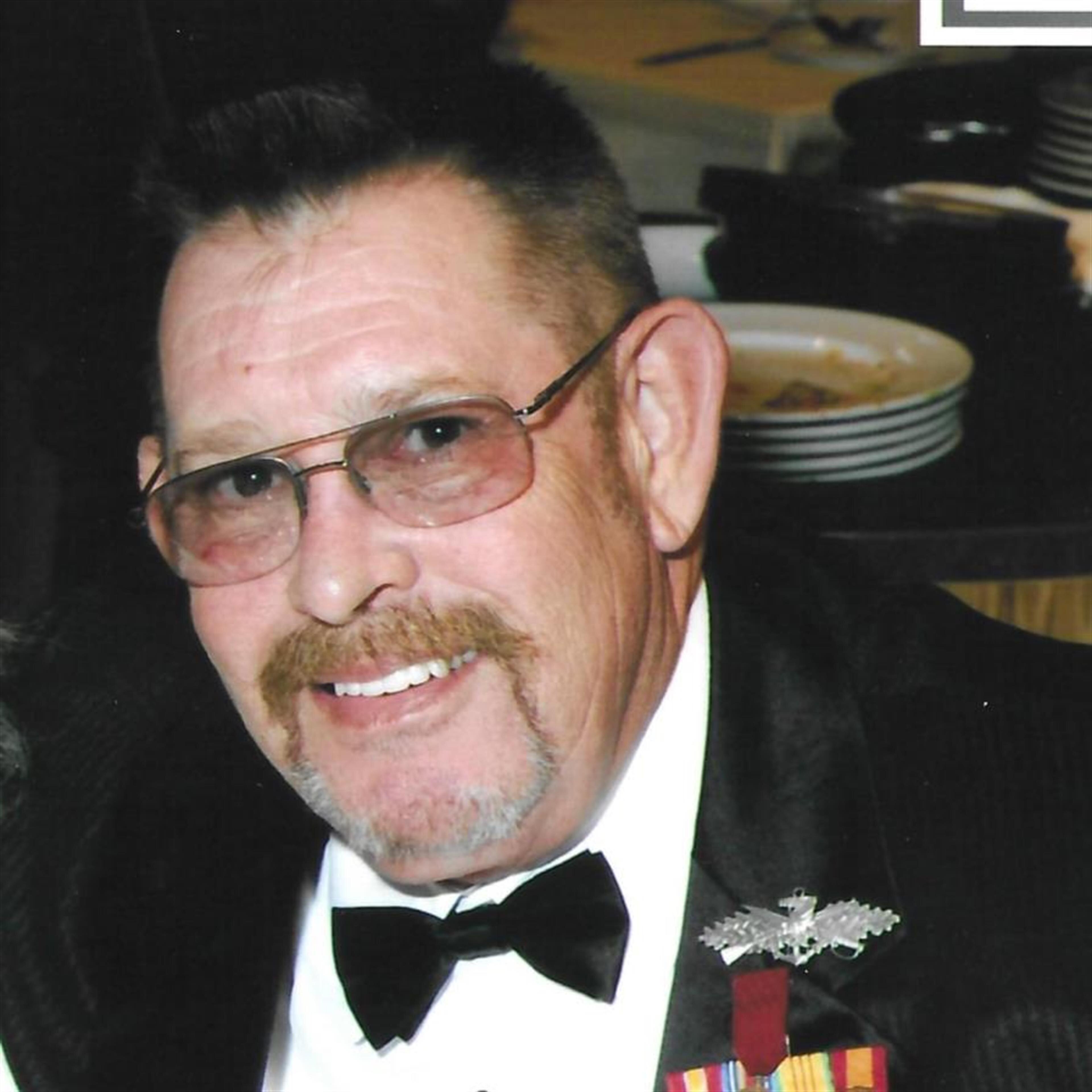 Patrick D Lyons