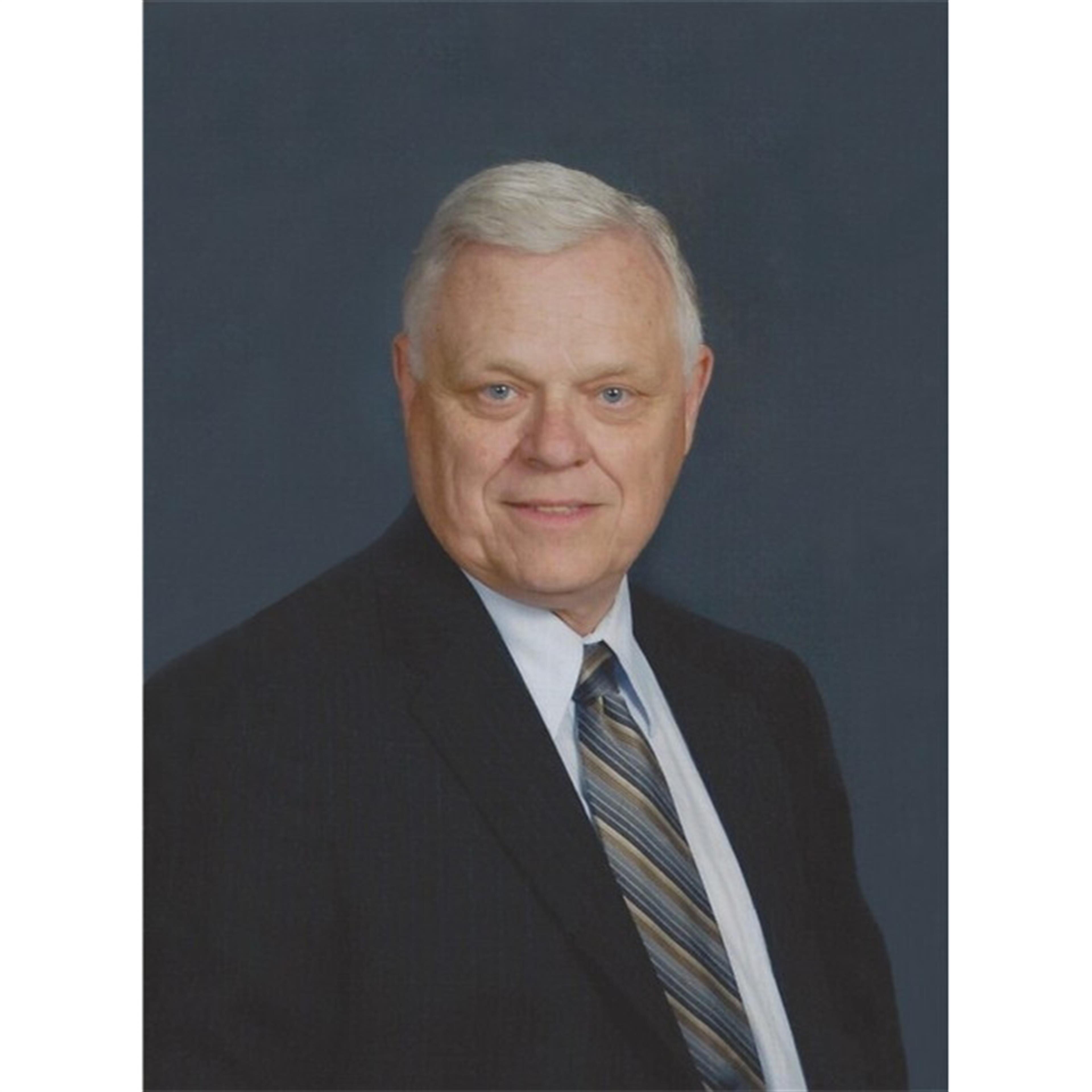 Henry E. "Woody" Kramer