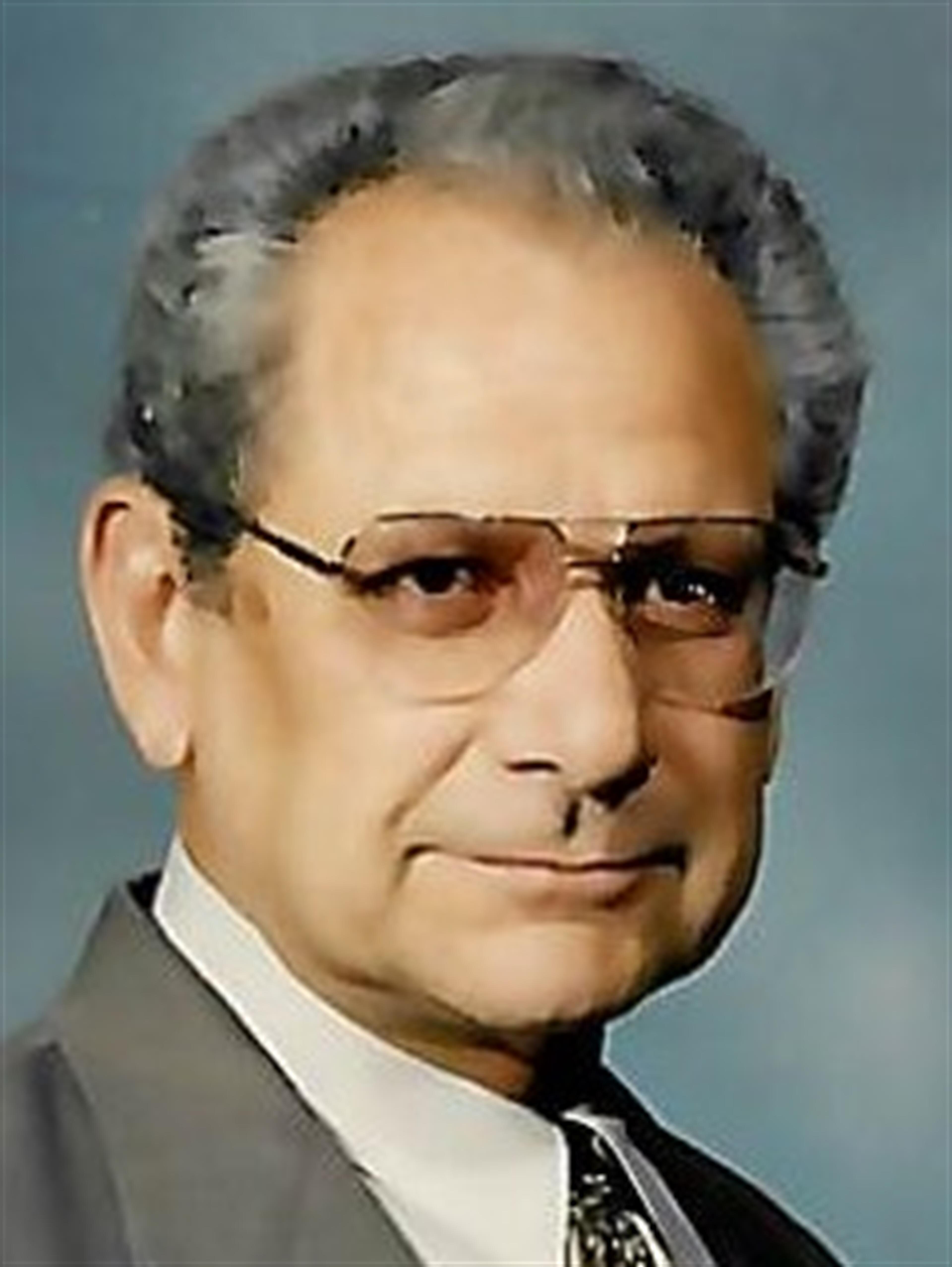 John R. Luvison