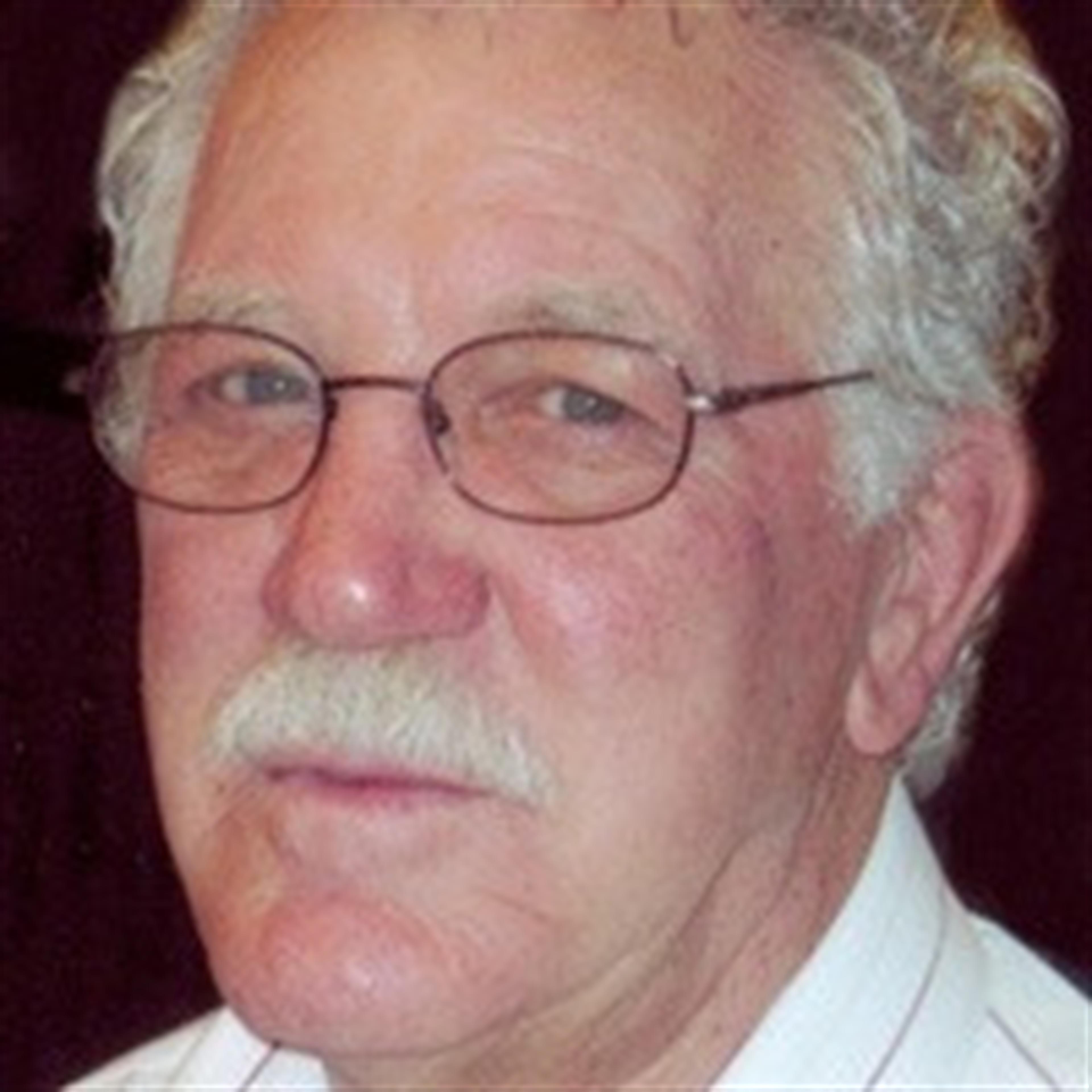 Norris L "Tad" Mansholt