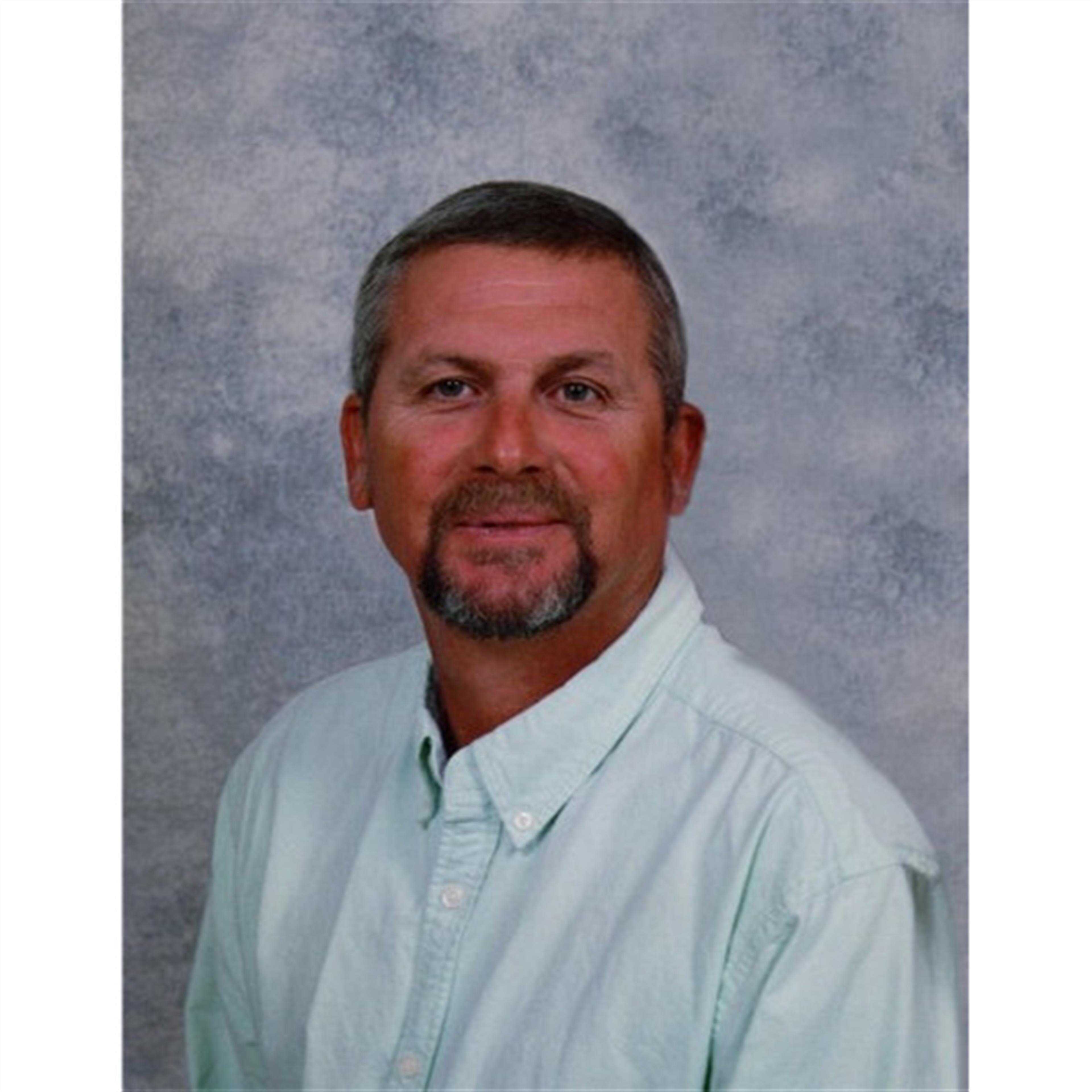 Charles "Chuck" E. Adams